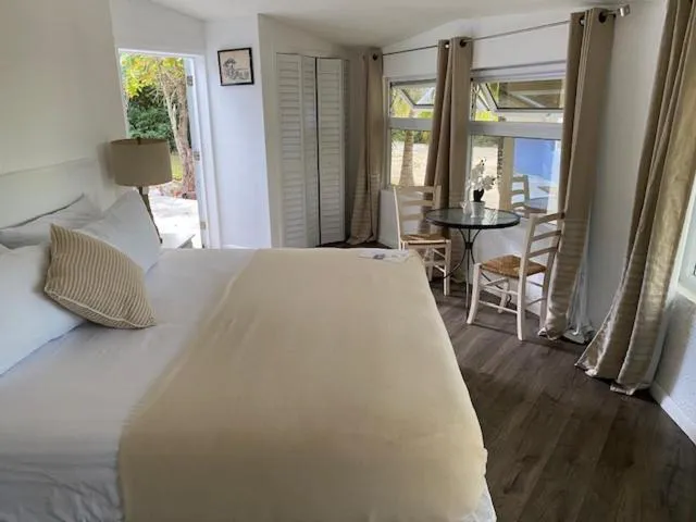 Bed in The Sunset Cove and Rainbow Room