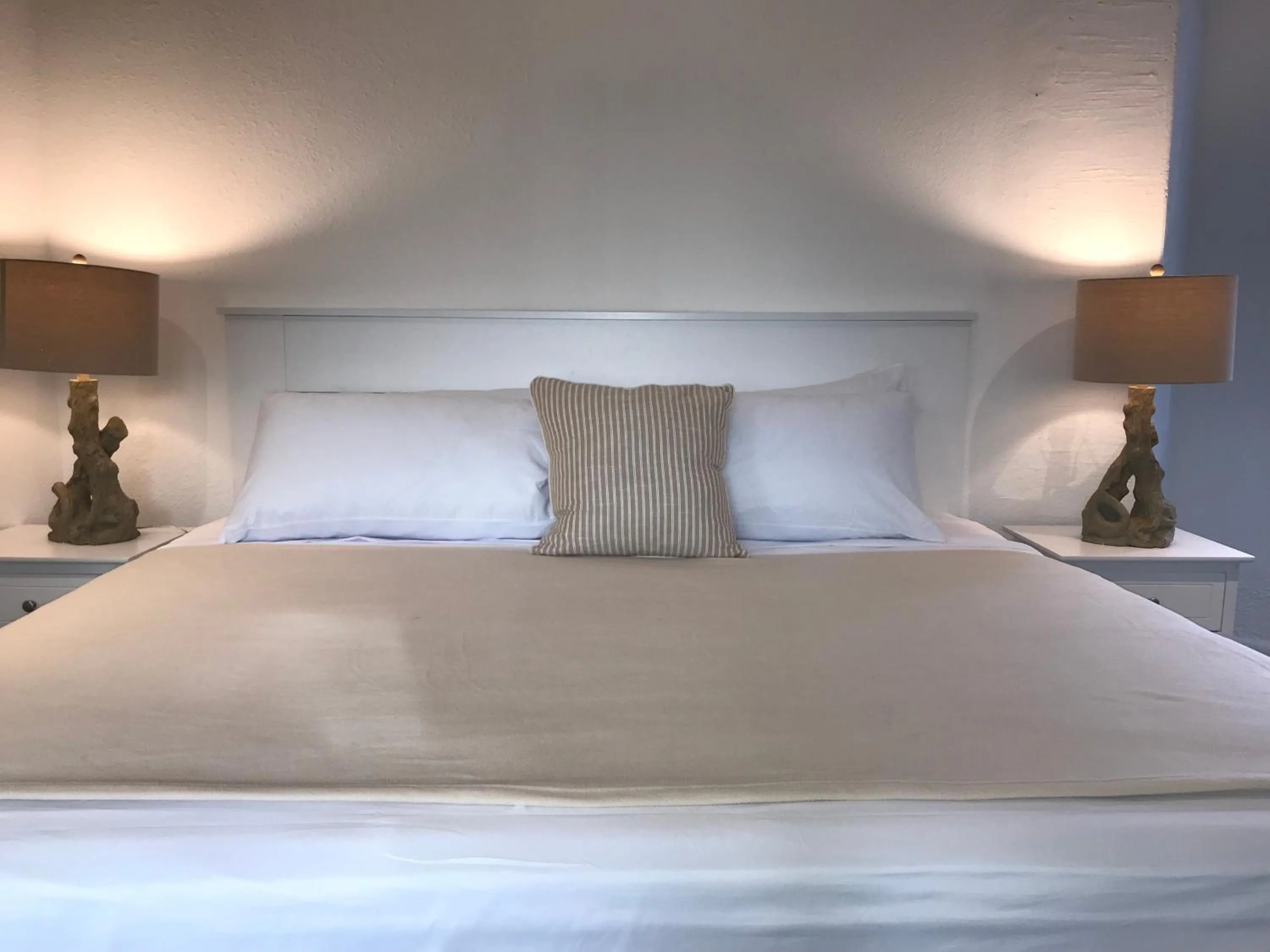 Bed in The Sunset Cove and Rainbow Room