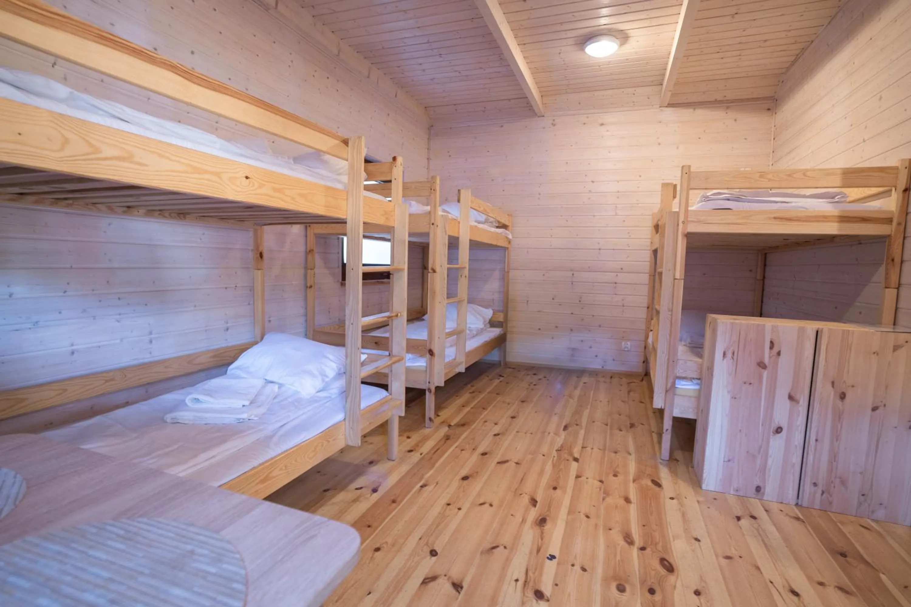 Bed in Pod Cyprysami - surf & family resort