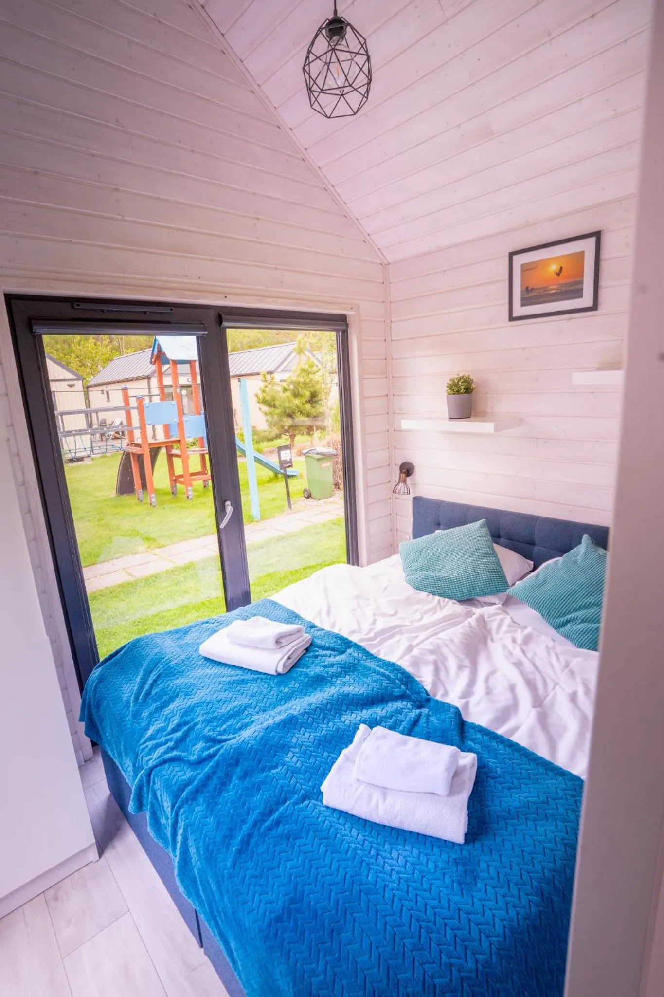 Bed in Pod Cyprysami - surf & family resort