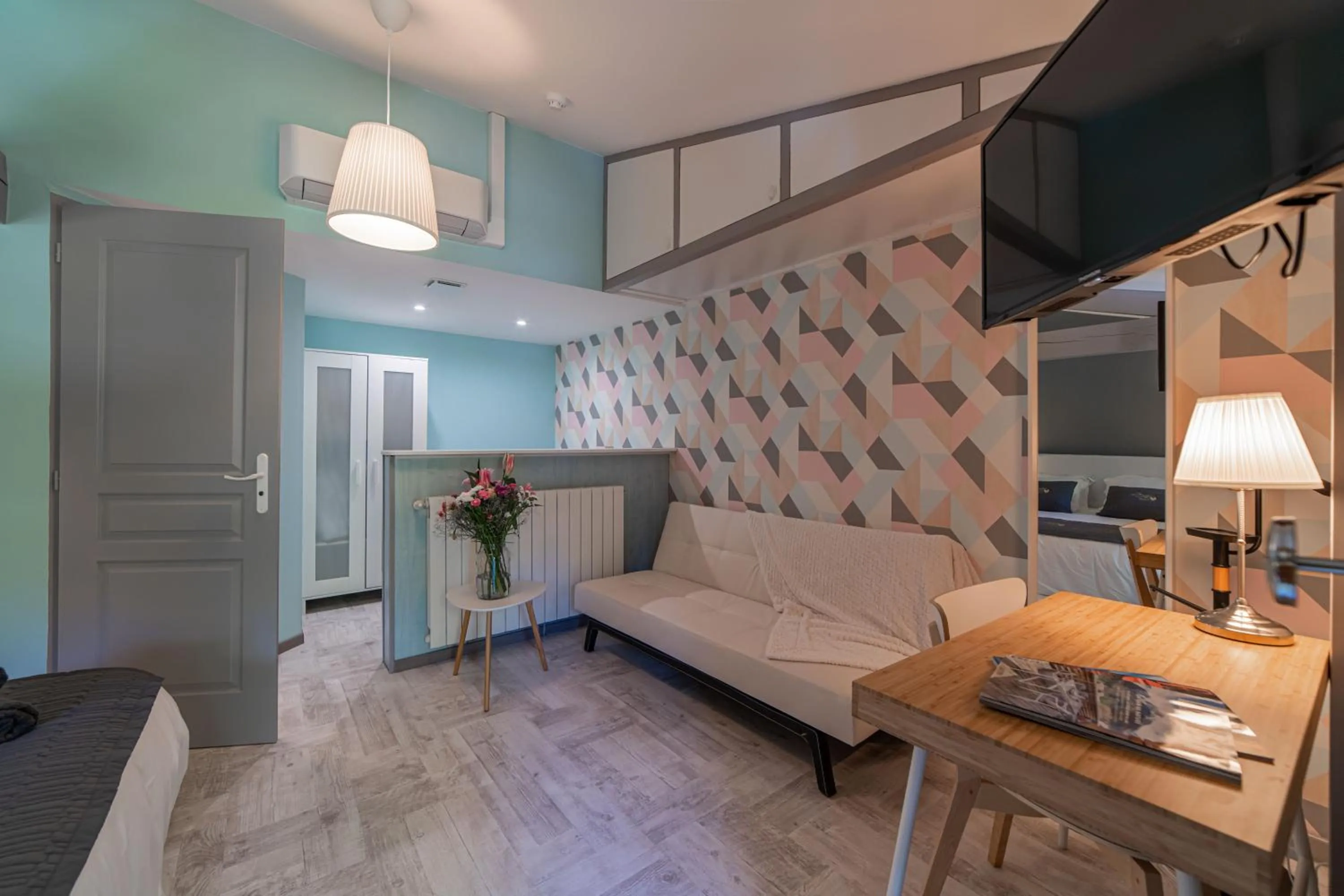 Photo of the whole room in Hôtel Au Coq Dort Spa