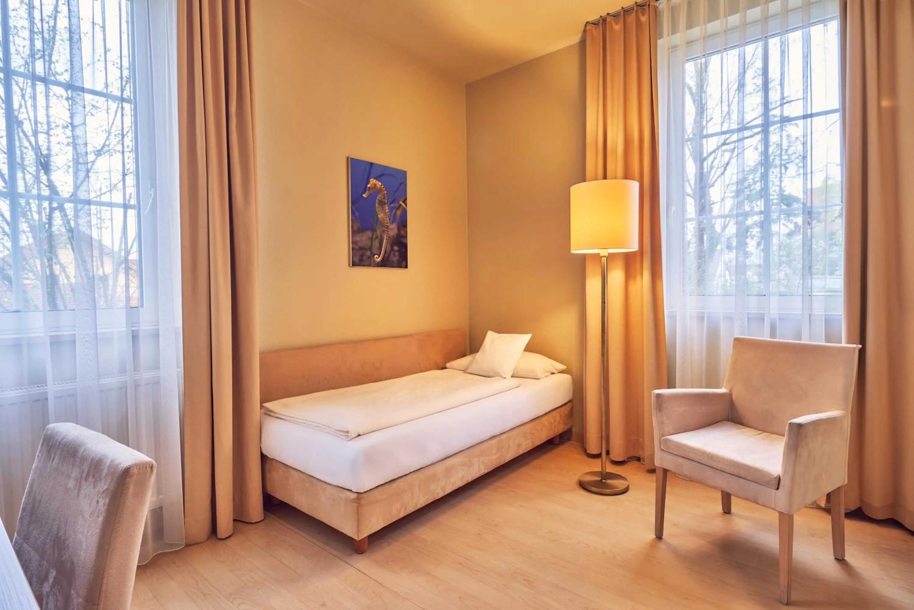 Photo of the whole room, Bed in AKZENT Hotel Aufkirchen