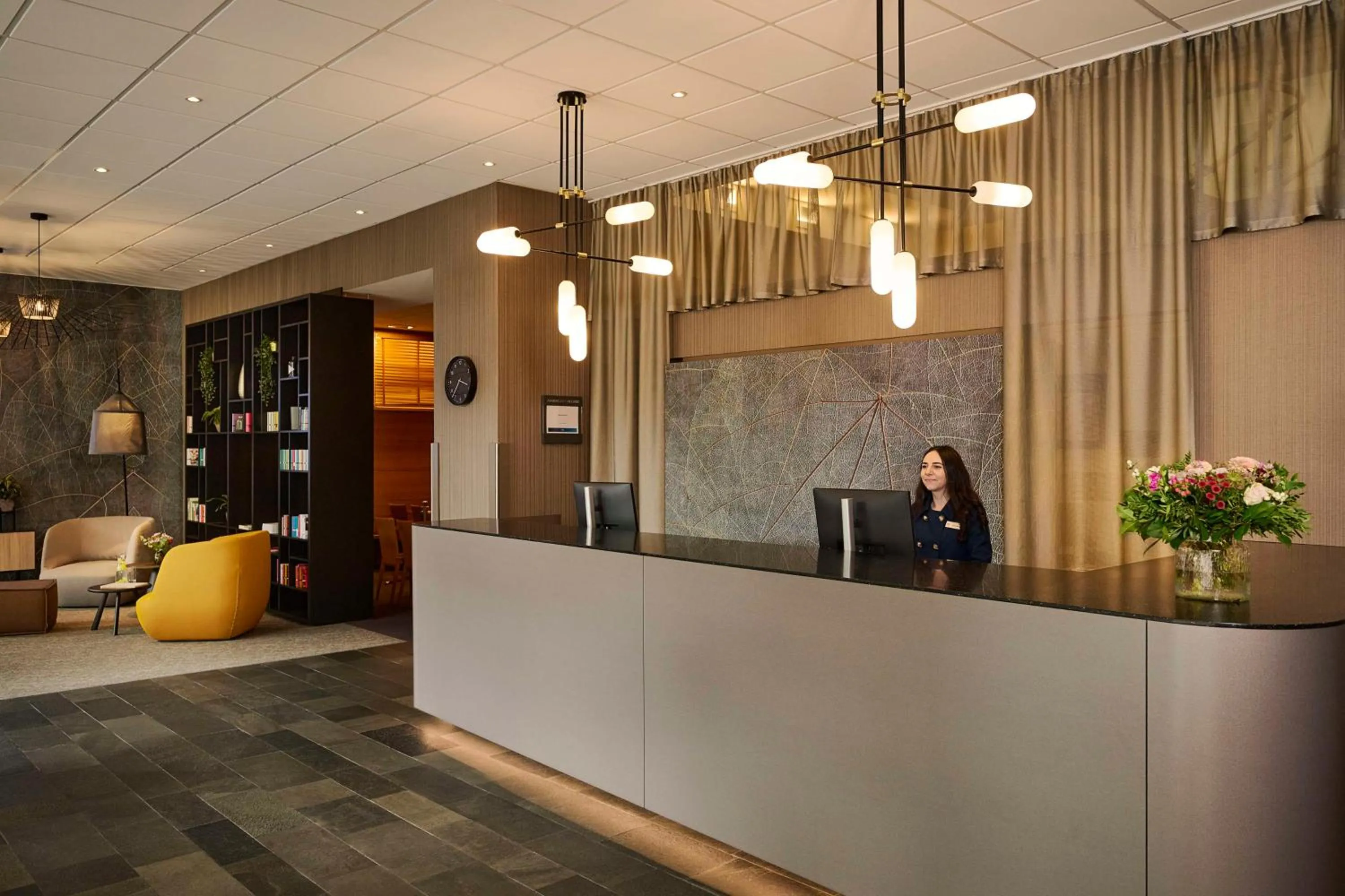 Lobby or reception in NH Erlangen