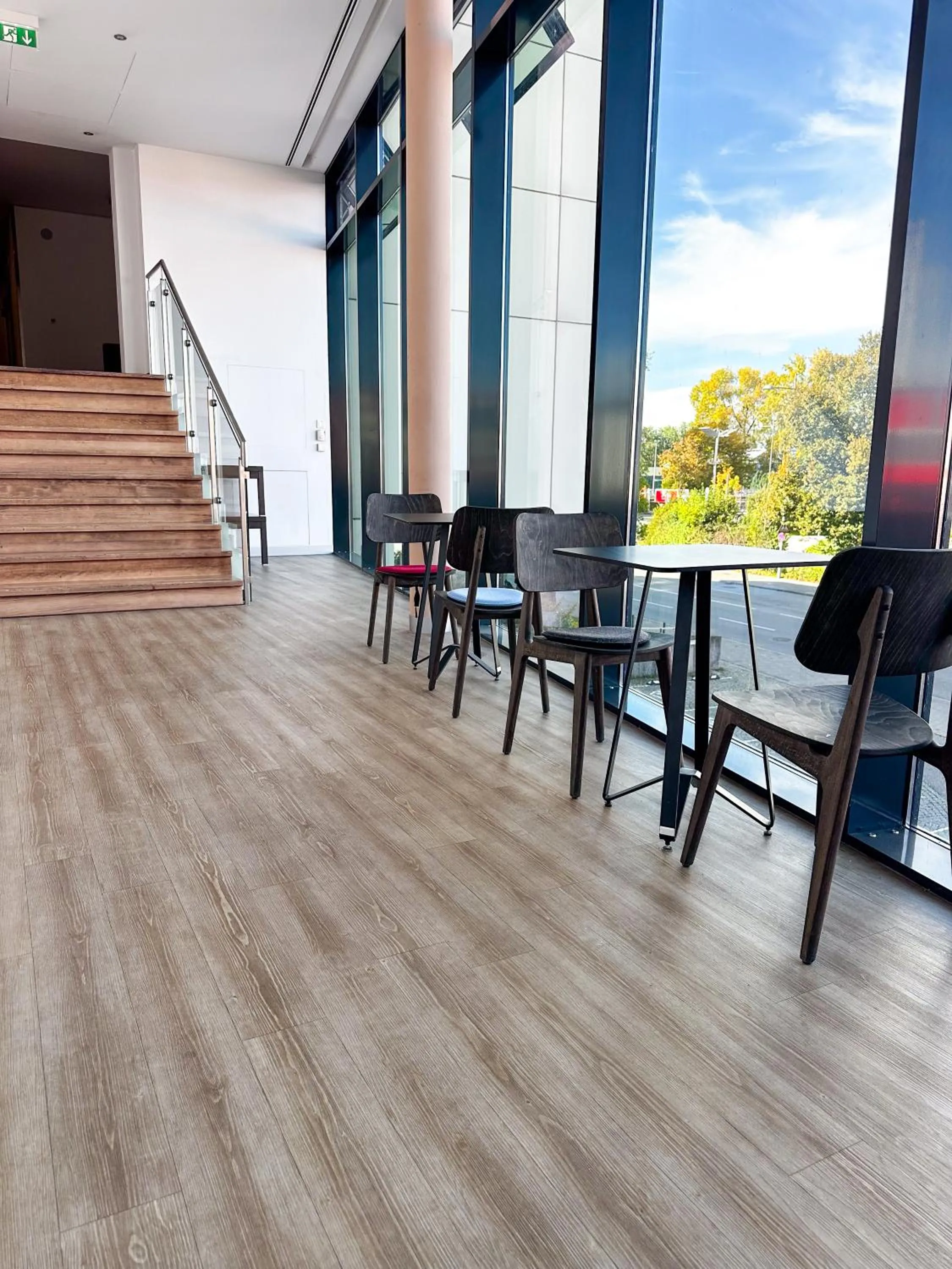 Communal lounge/ TV room in Feringapark Hotel by Coffee Fellows Hotels