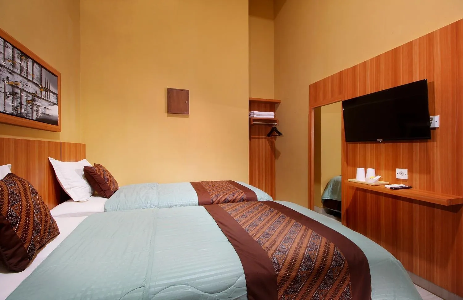 Bedroom, Bed in Hotel Radyoharto Mallioboro Yogyakarta