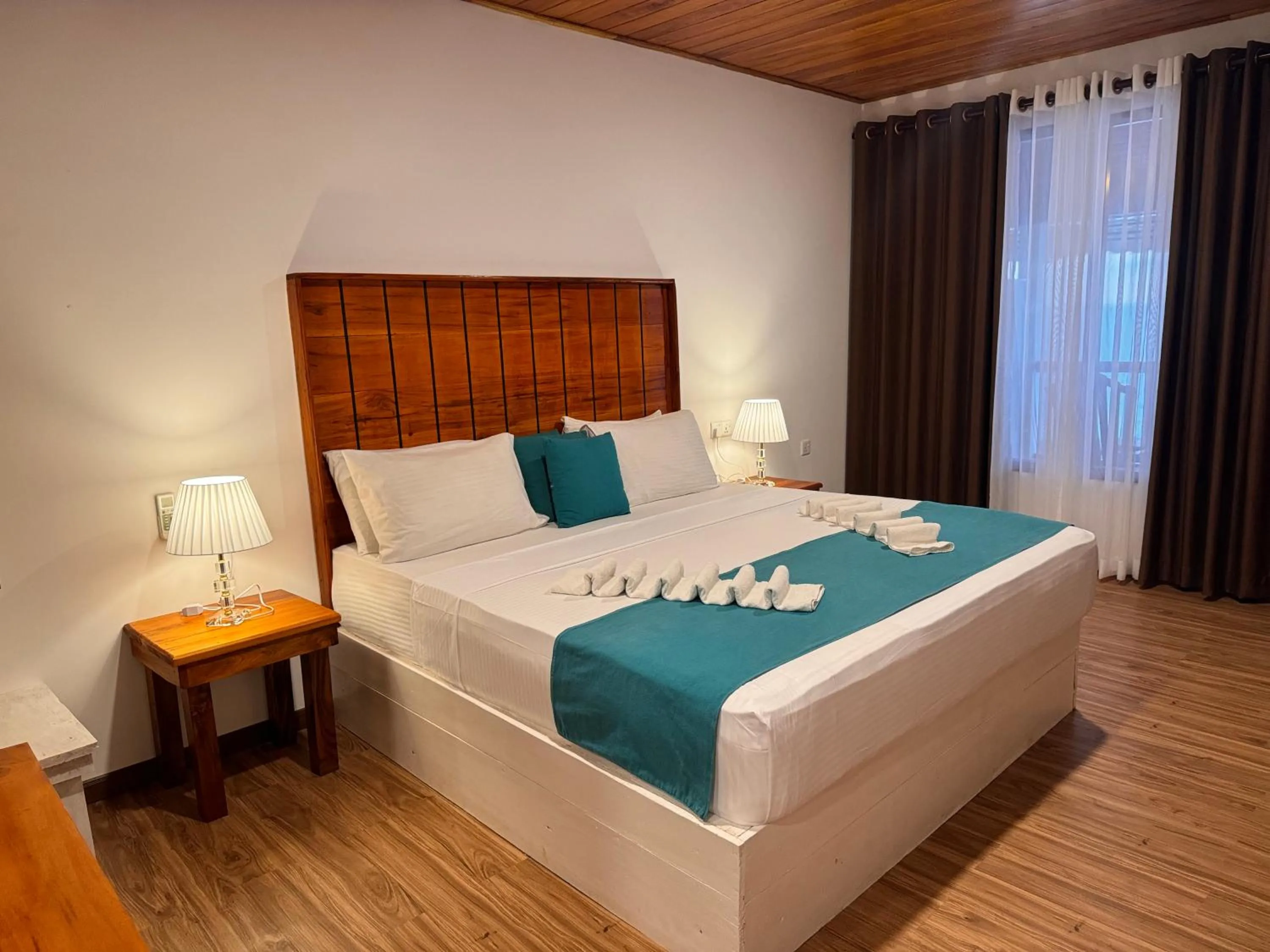 Photo of the whole room, Bed in One World Mirissa