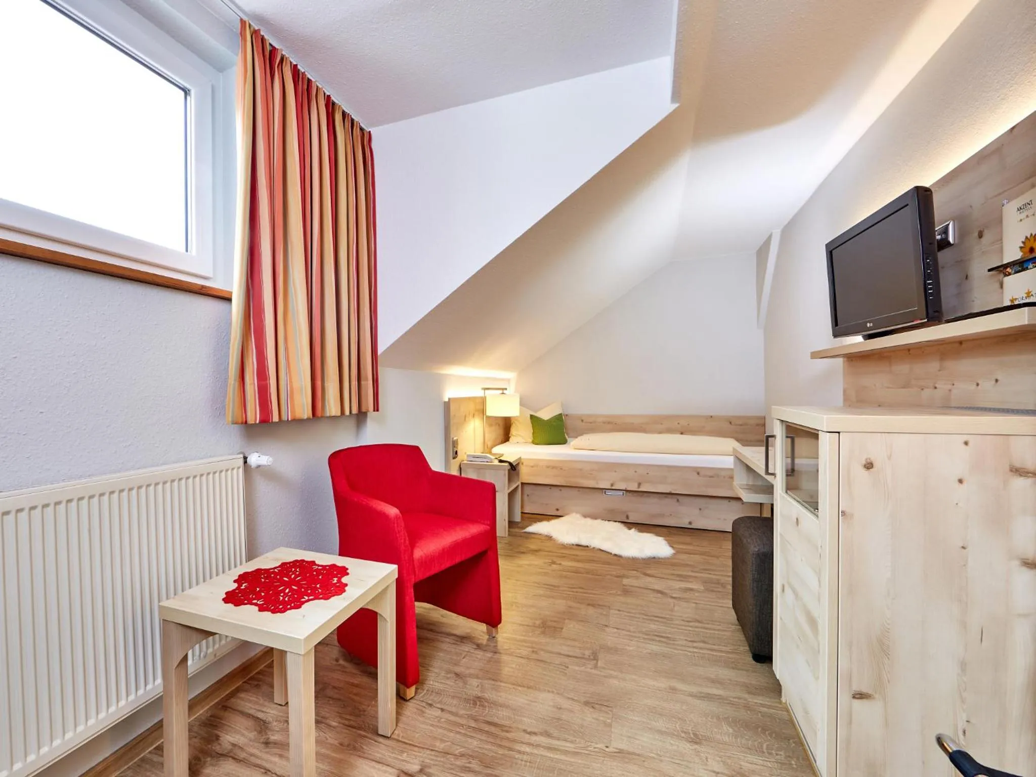 Photo of the whole room, Seating Area in AKZENT Hotel Turmwirt ***S