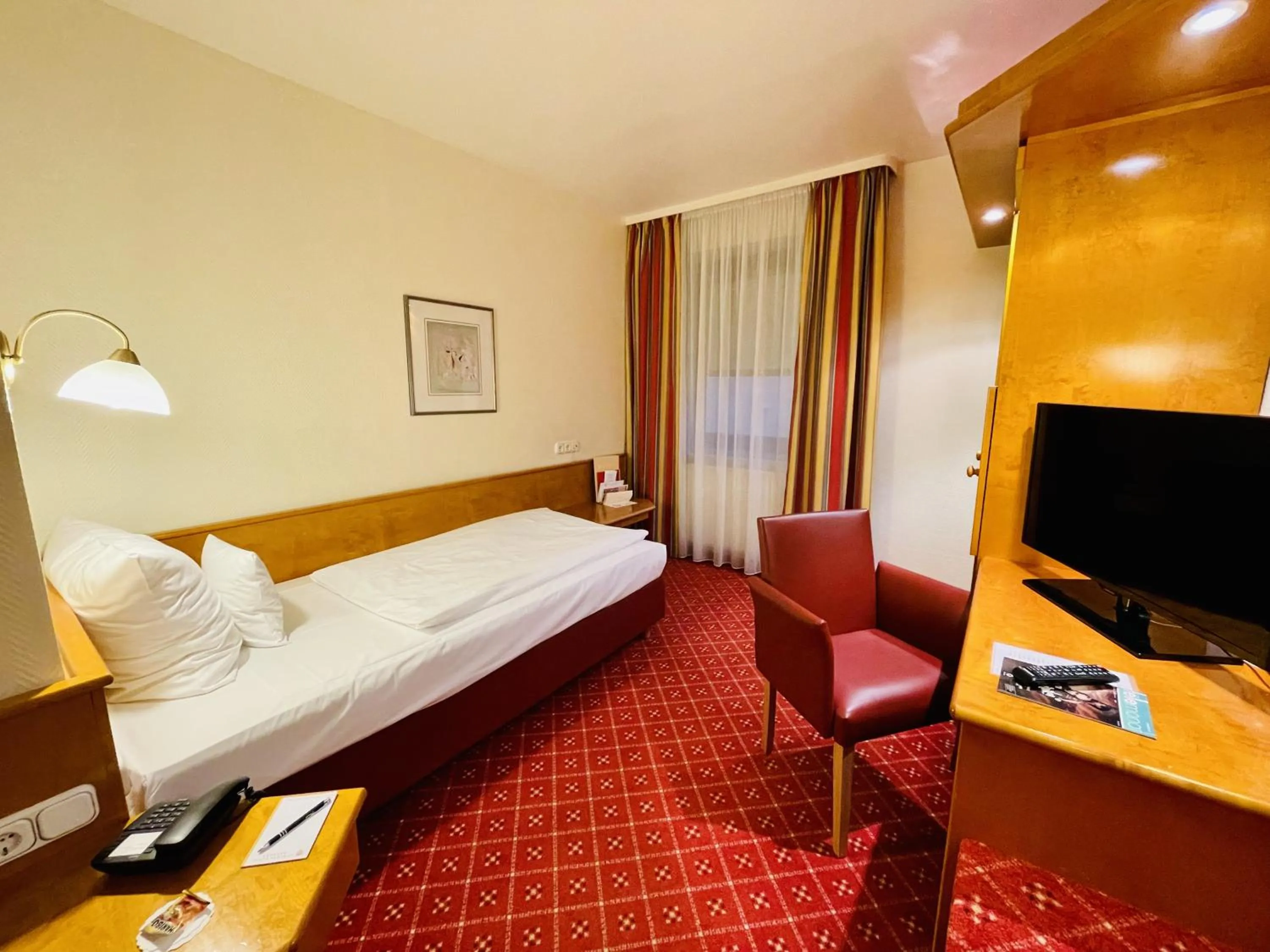 Photo of the whole room, Bed in Schloss Hotel Herborn