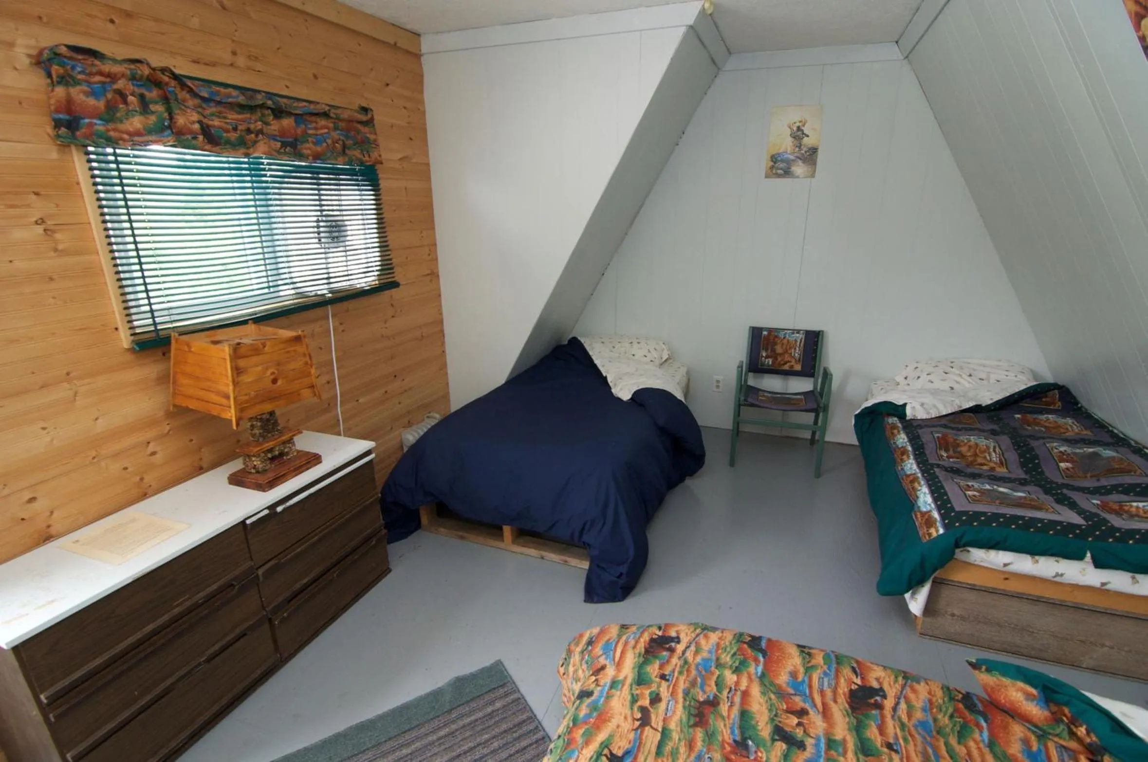 Bedroom, Bed in Yellow Dog Lodge, Inc.