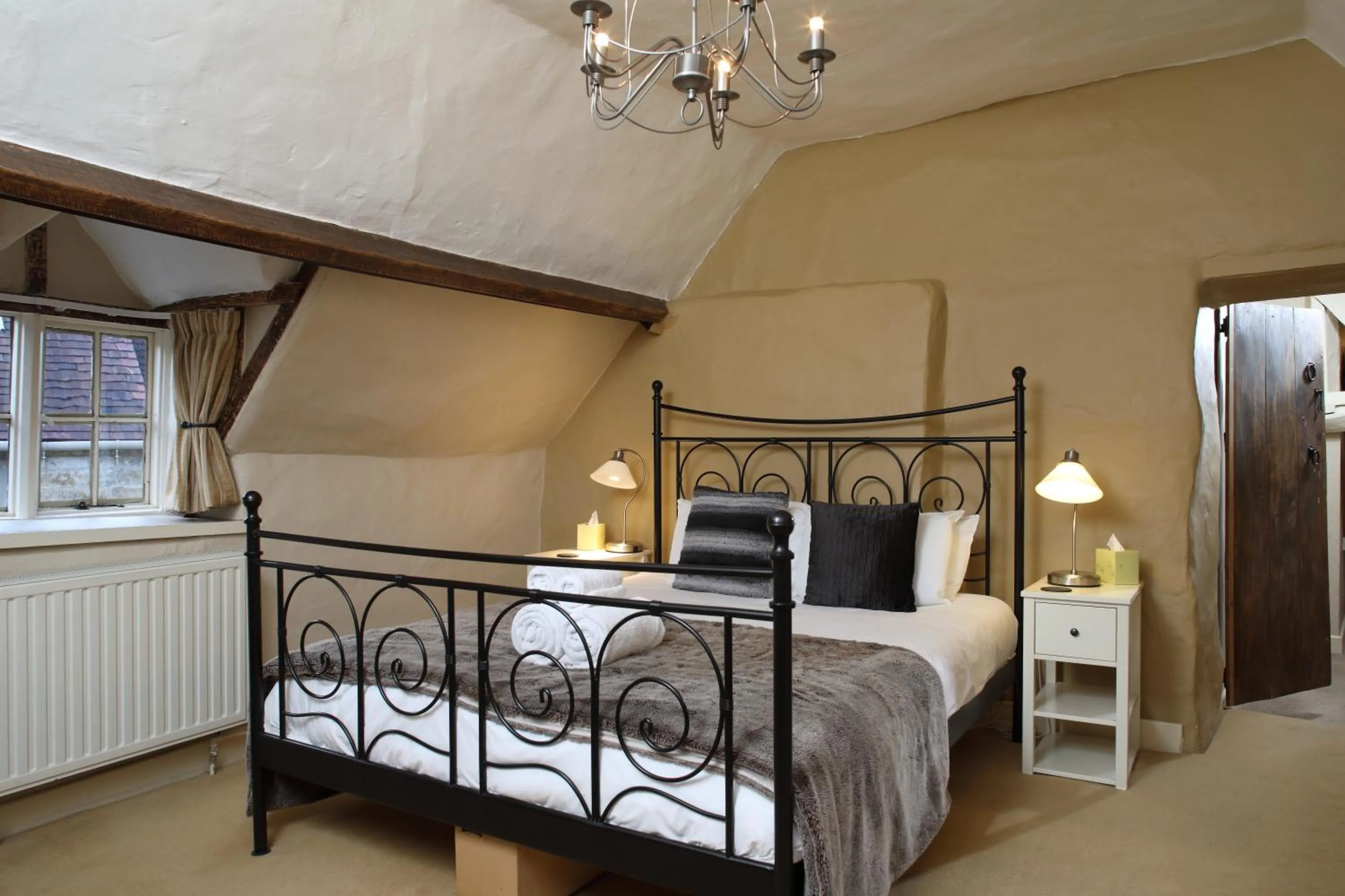 Bed in Eight Bells Inn