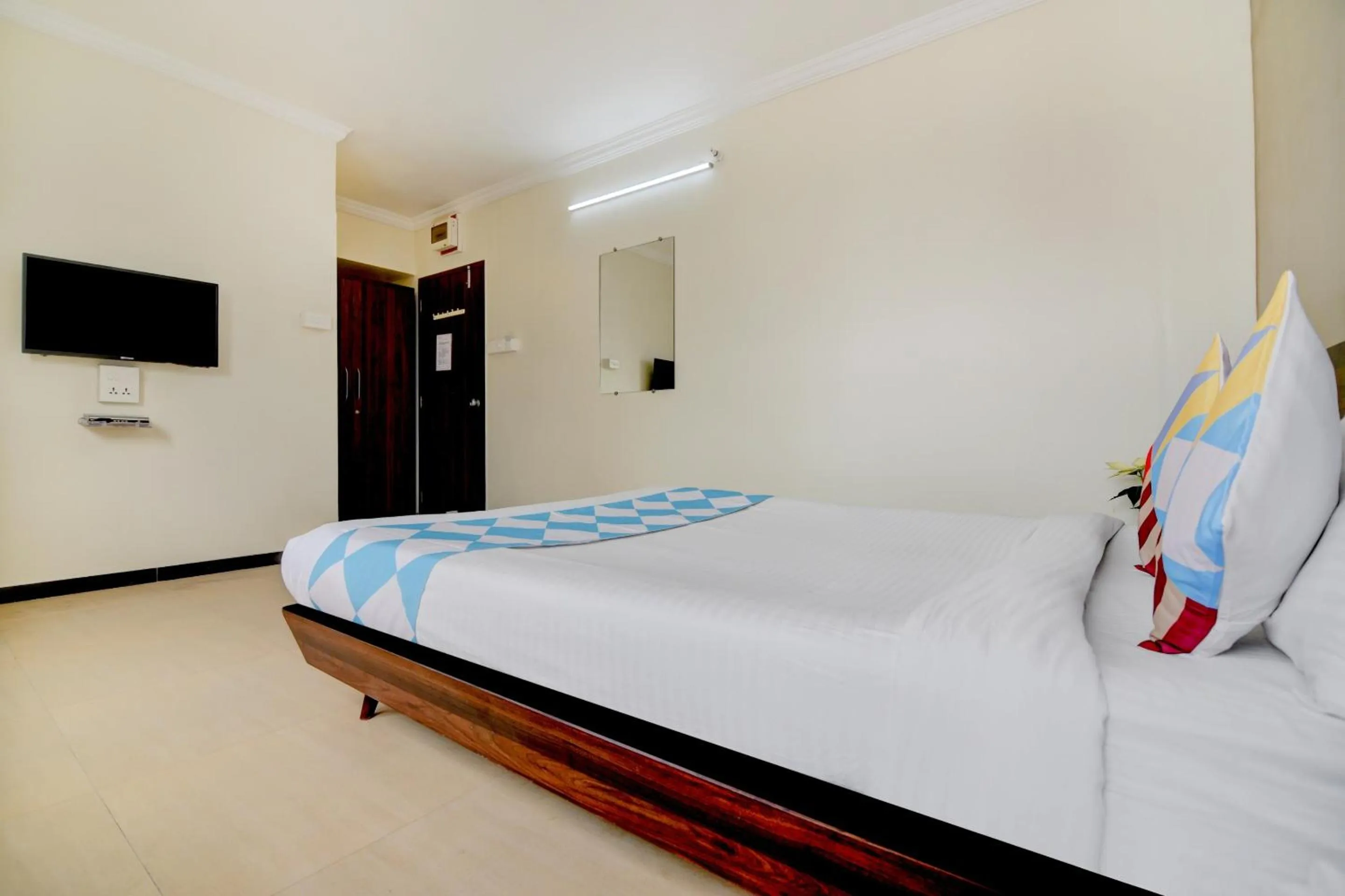 Bedroom in Hotel O Peaceful Stay Keshav Nagar.