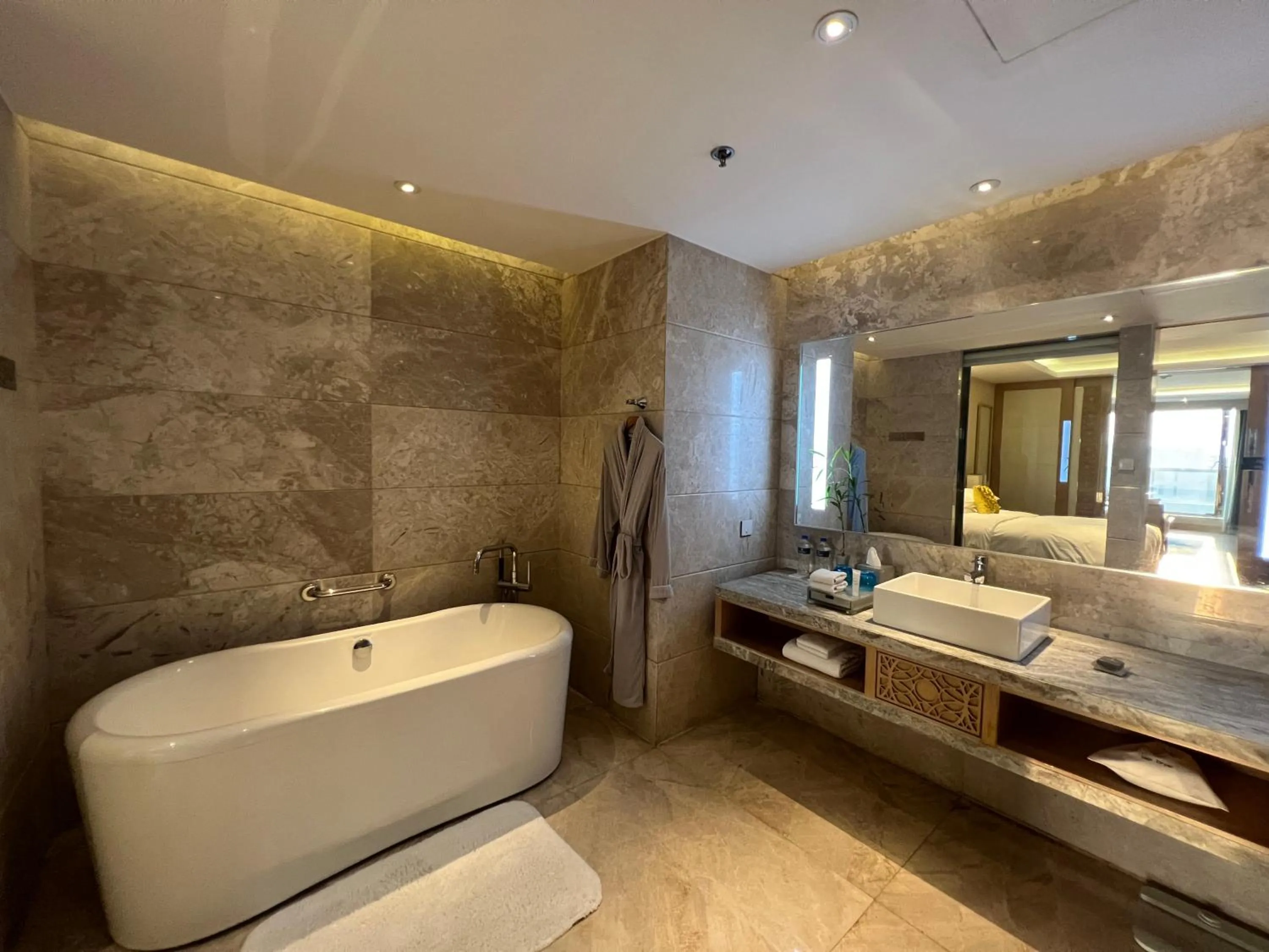 Bathroom, Bed in Renaissance Dhaka Gulshan Hotel