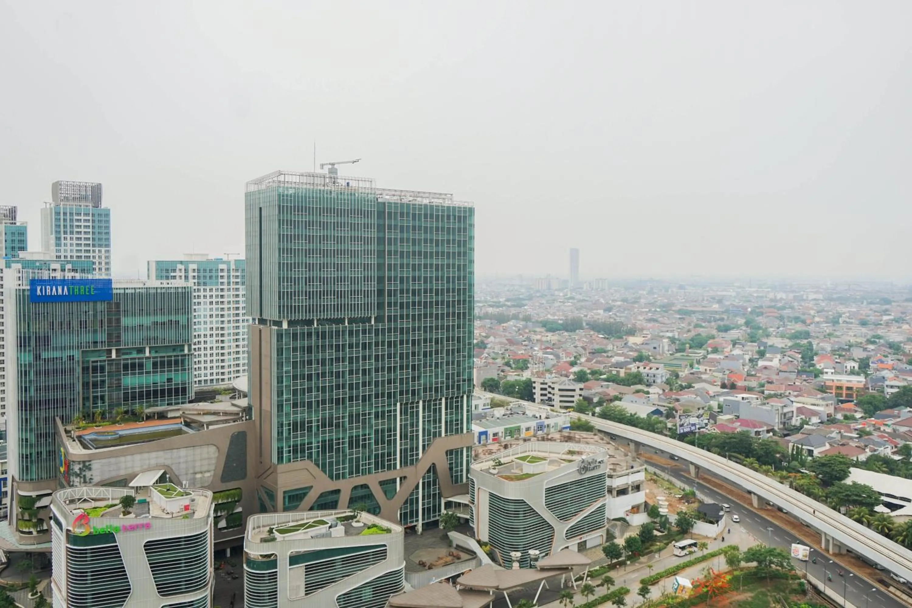 City view in Best Price 2BR at Tifolia Apartment By Travelio