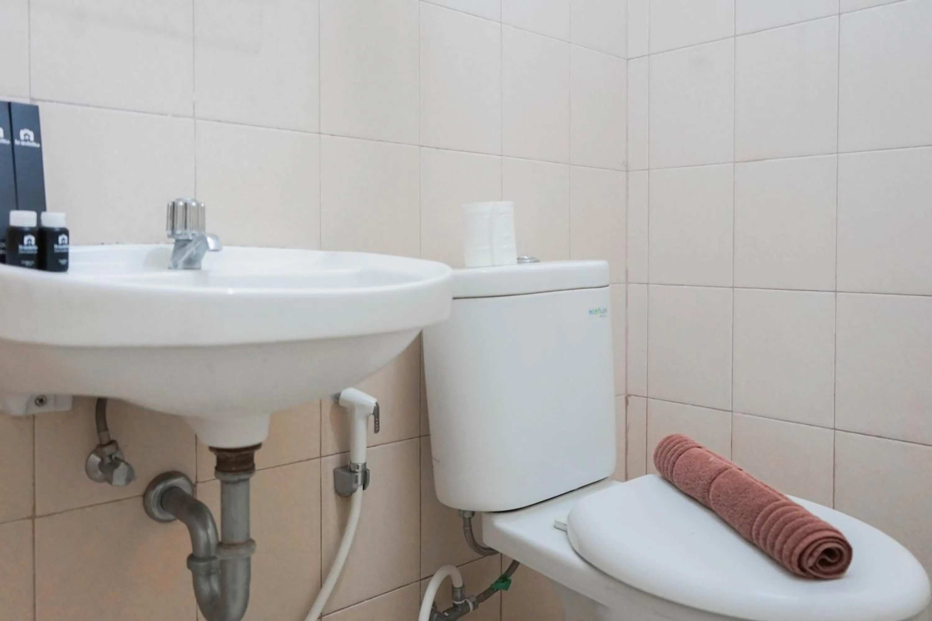 Bathroom in Best Price 2BR at Tifolia Apartment By Travelio