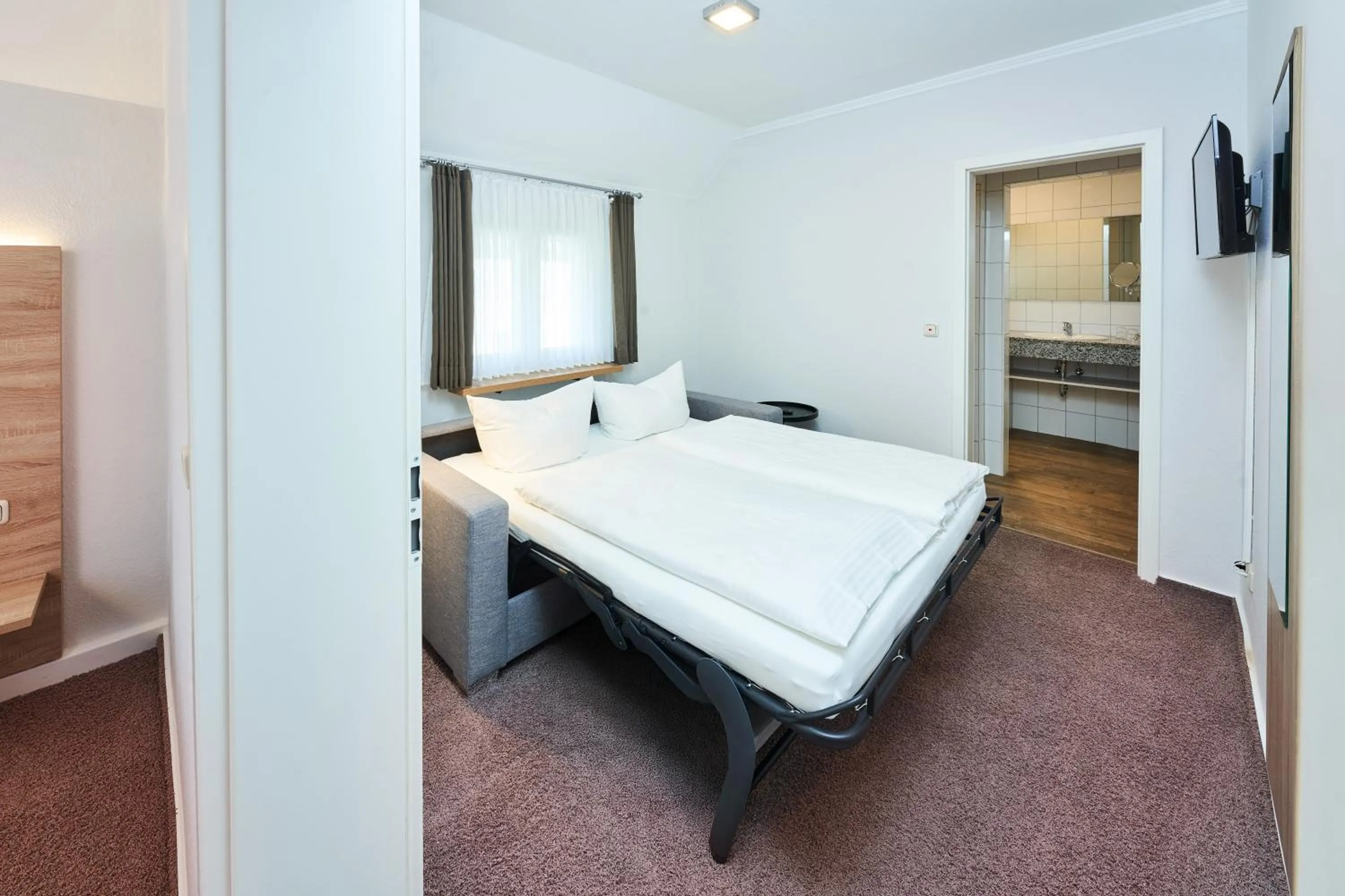 Bed in Das Landhotel am Trätzhof Fulda