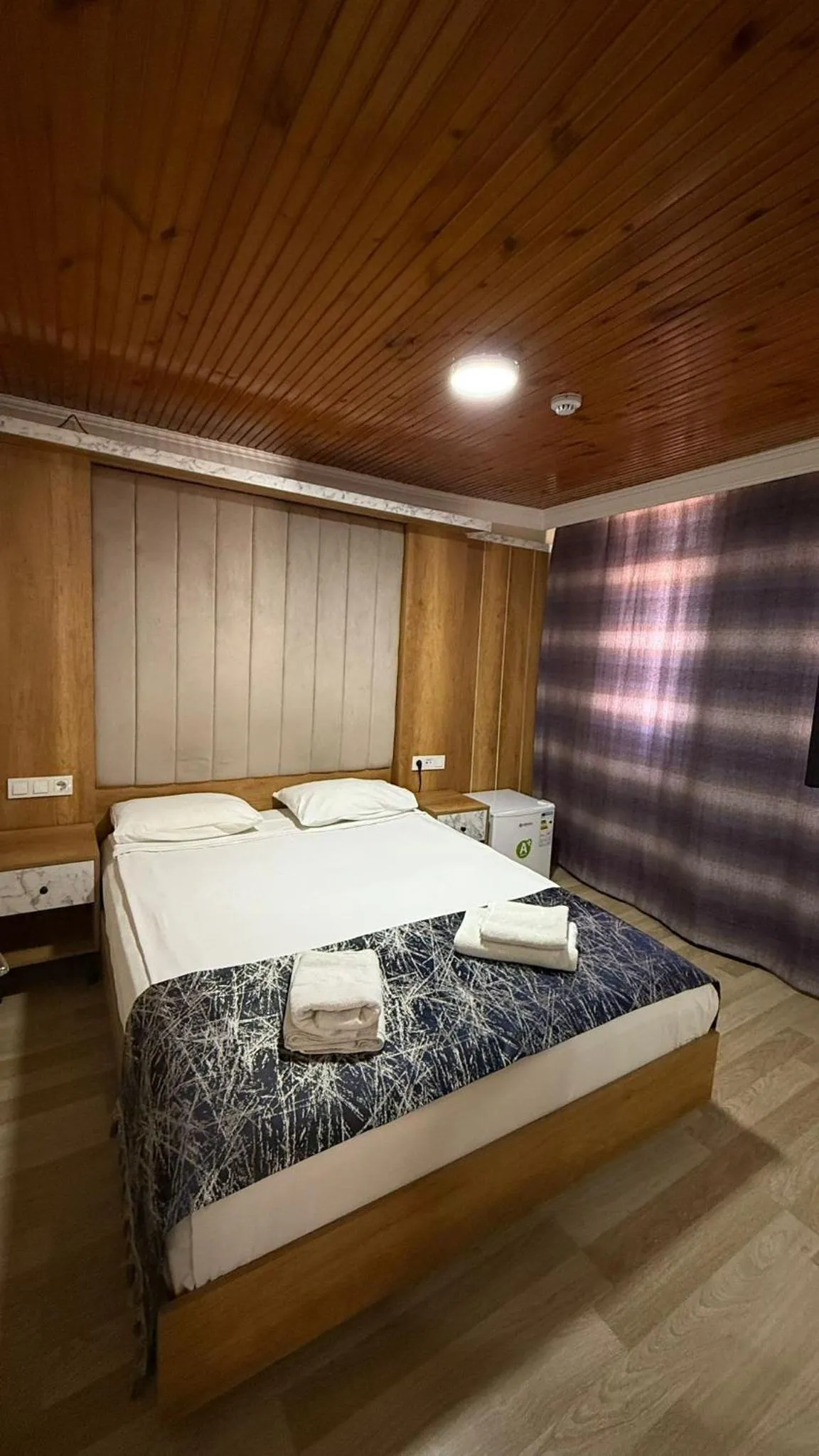 Bed in Han Suite Hotel