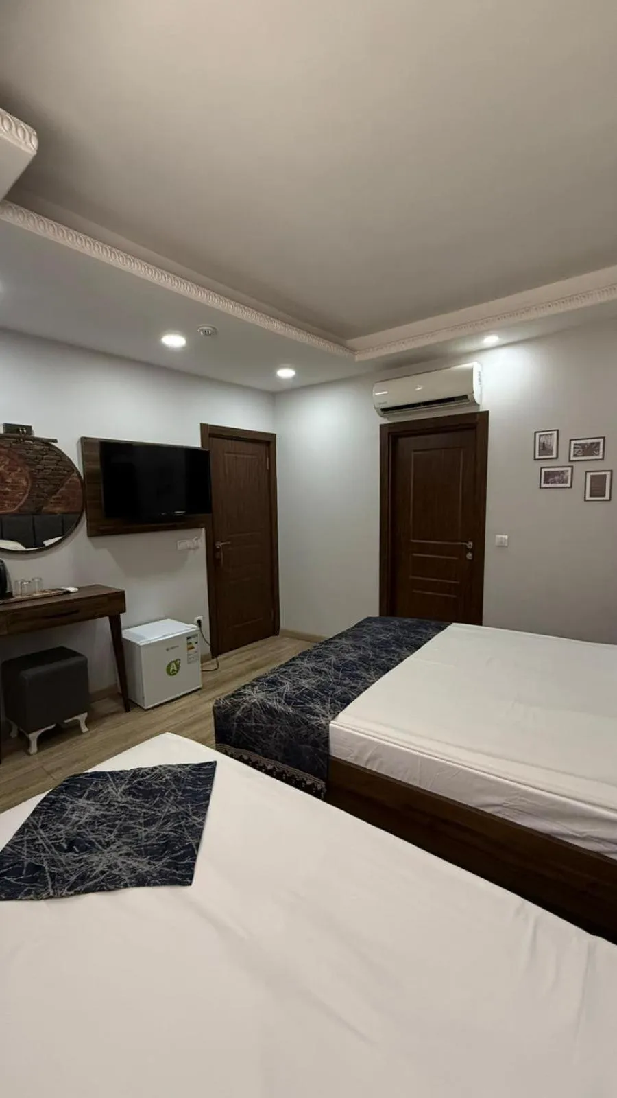 Bed in Han Suite Hotel