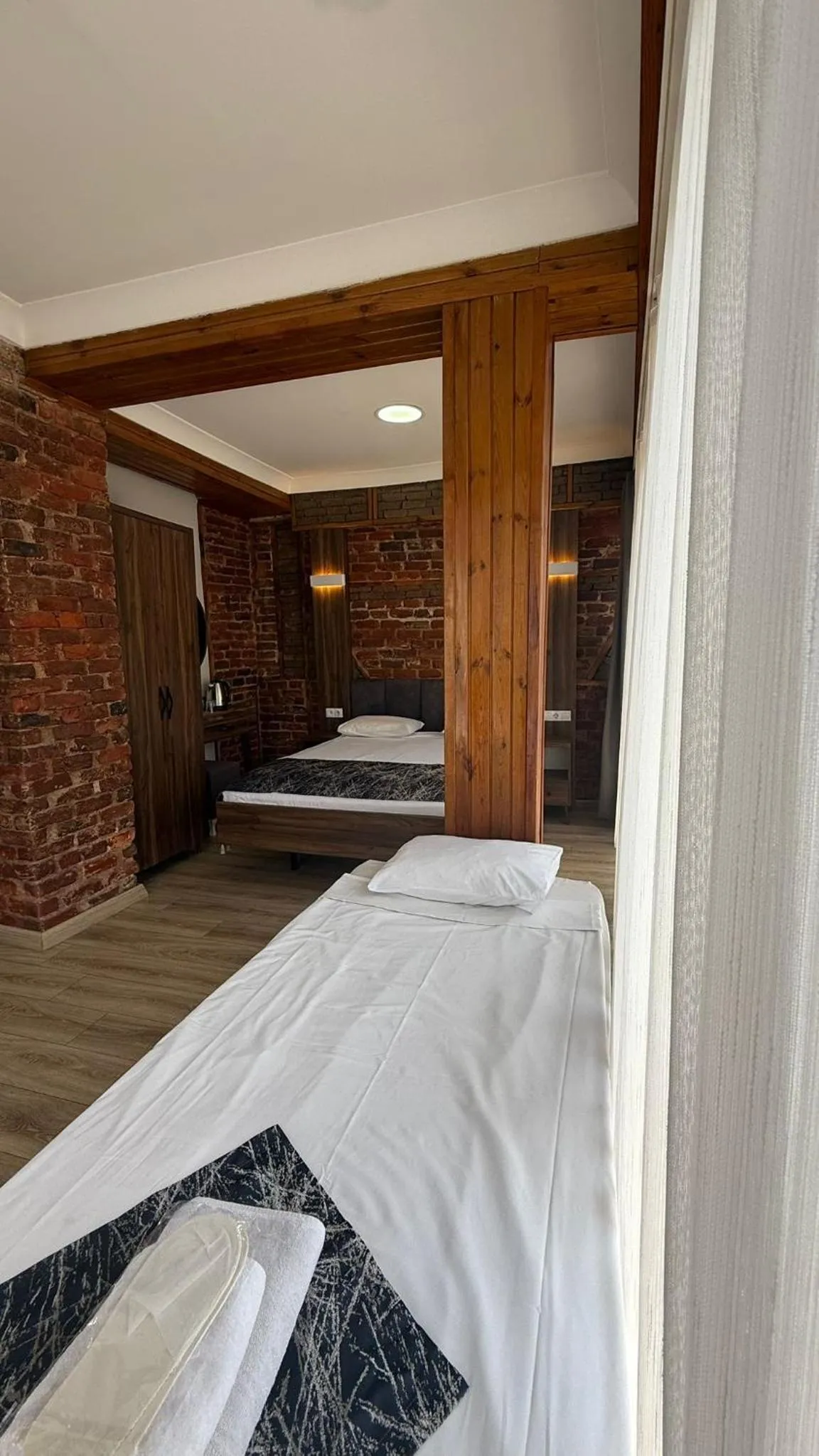 Photo of the whole room, Bed in Han Suite Hotel