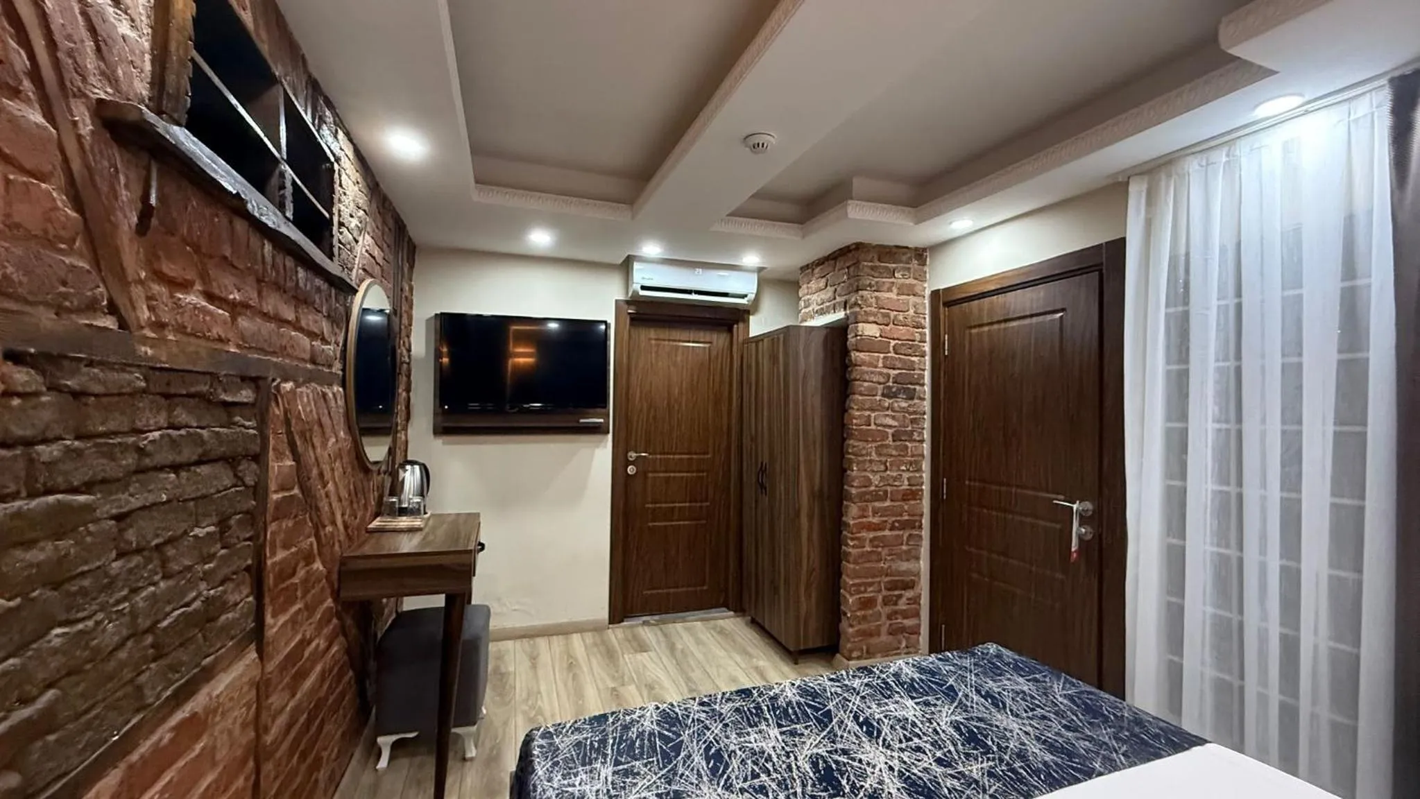 Bed in Han Suite Hotel