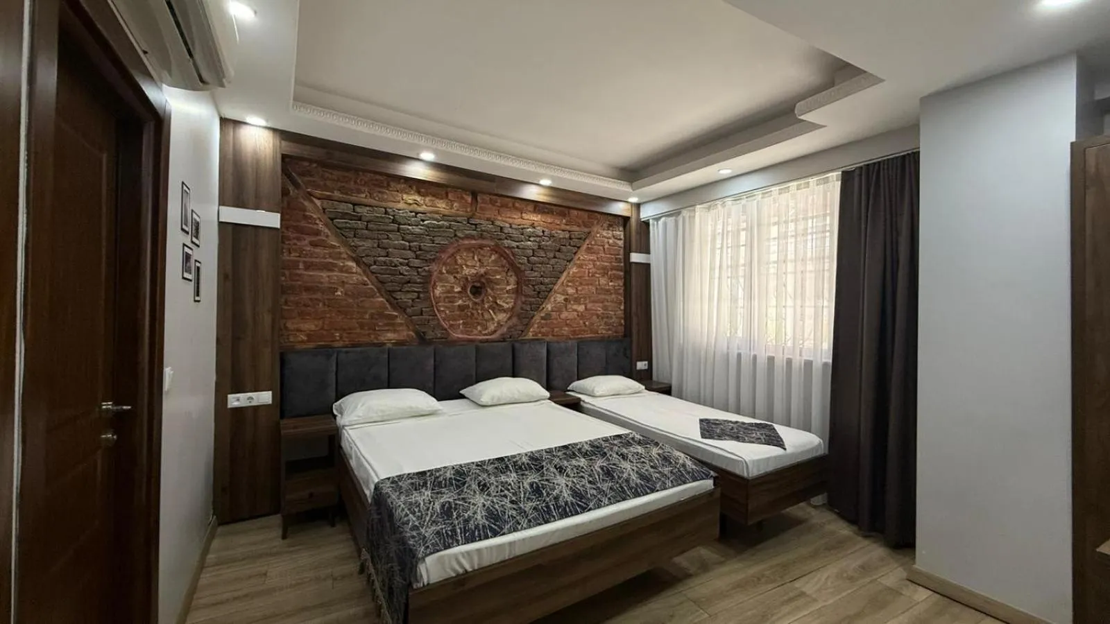 Bed in Han Suite Hotel