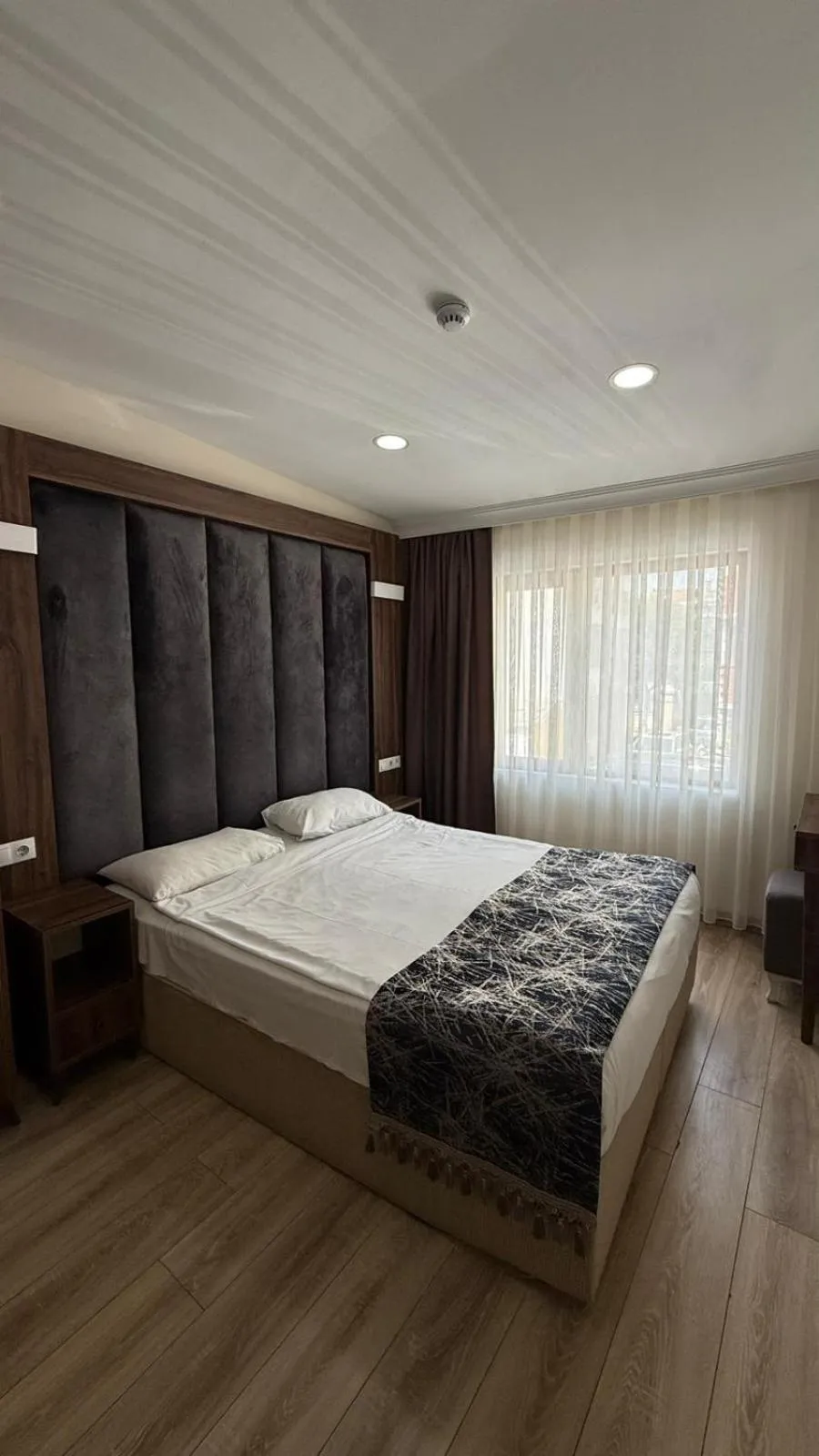 Photo of the whole room, Bed in Han Suite Hotel