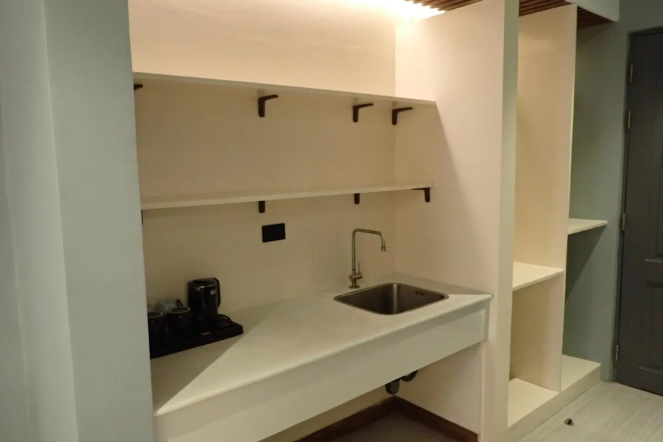 Kitchen or kitchenette in Only Seed Resort 欧芮希度假酒店