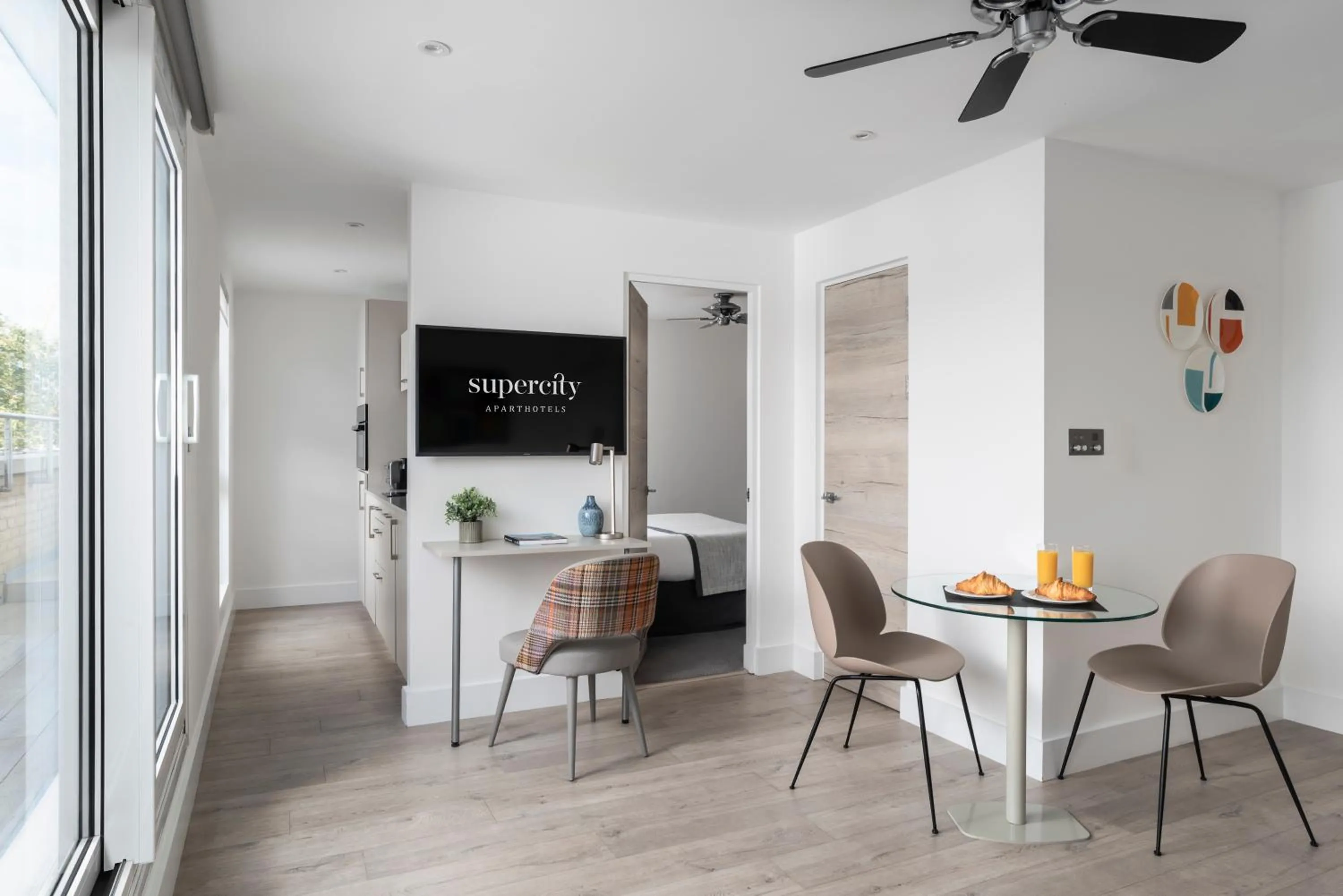 Dining area in Q Square by Supercity Aparthotels