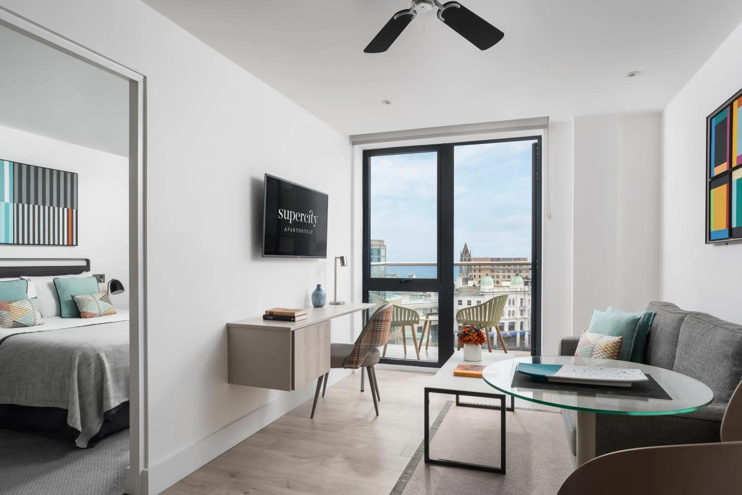 Living room, Bed in Q Square by Supercity Aparthotels