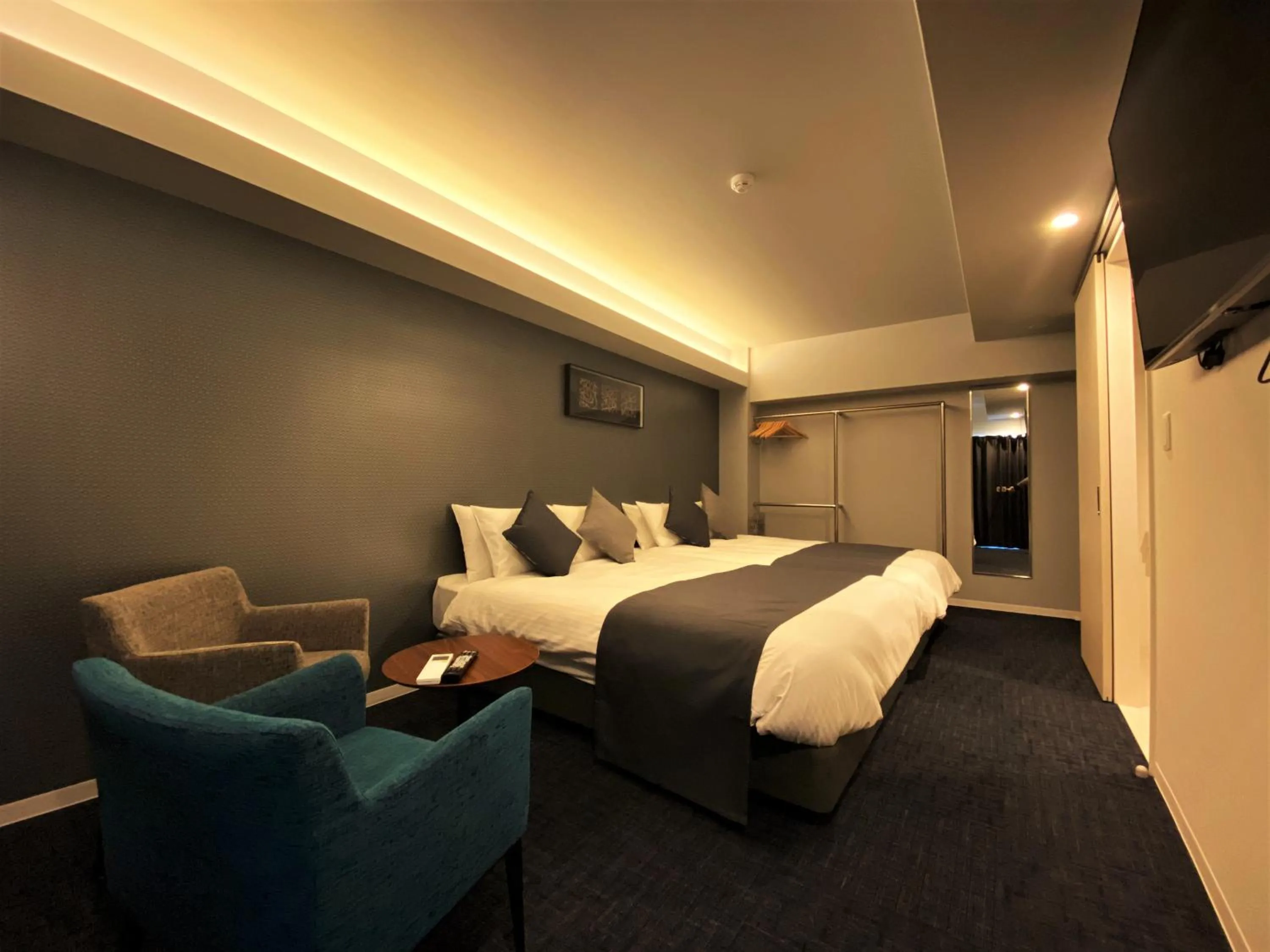 Photo of the whole room, Bed in Randor Residential Hotel Fukuoka Annex