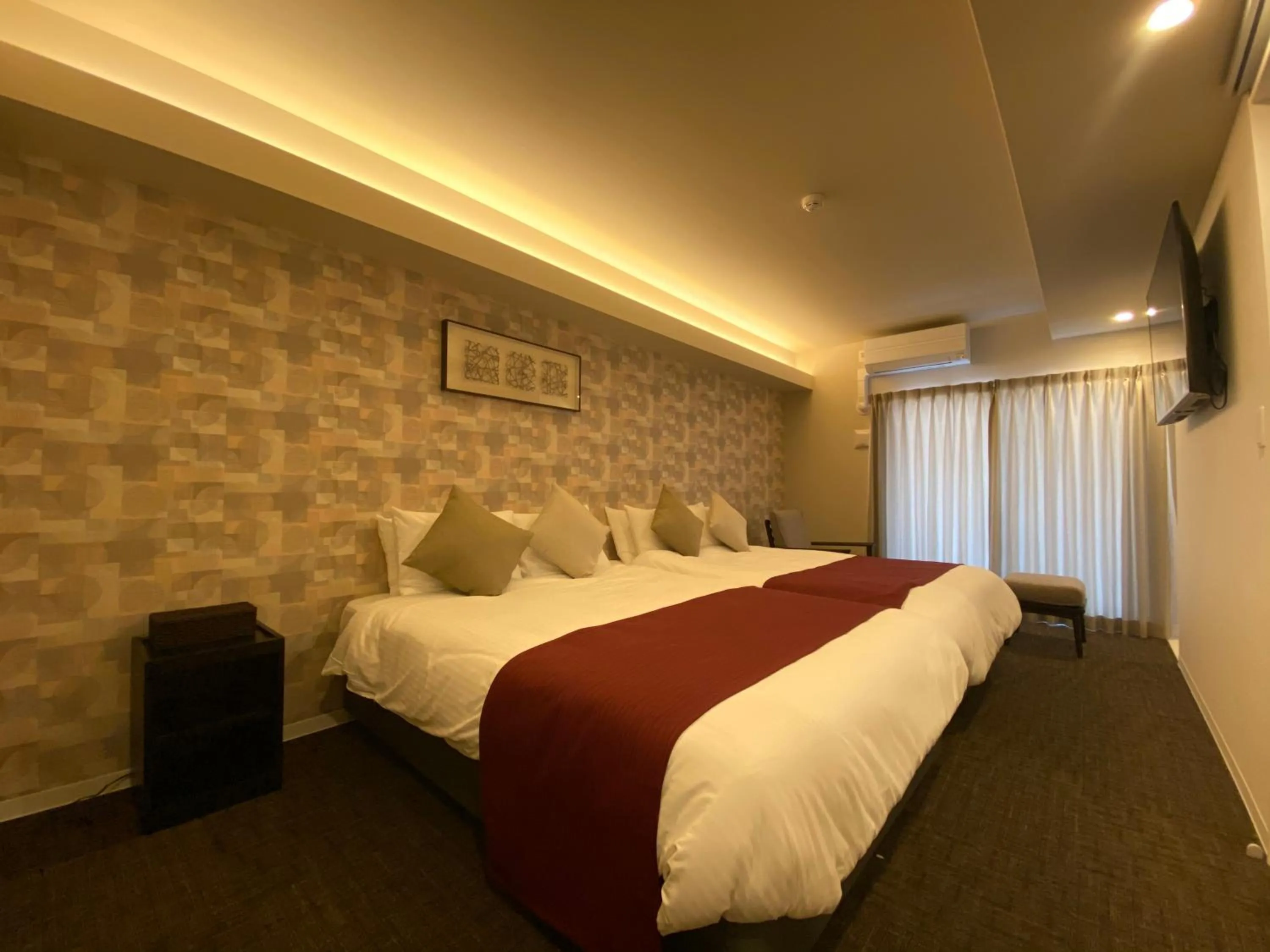 Bedroom, Bed in Randor Residential Hotel Fukuoka Annex