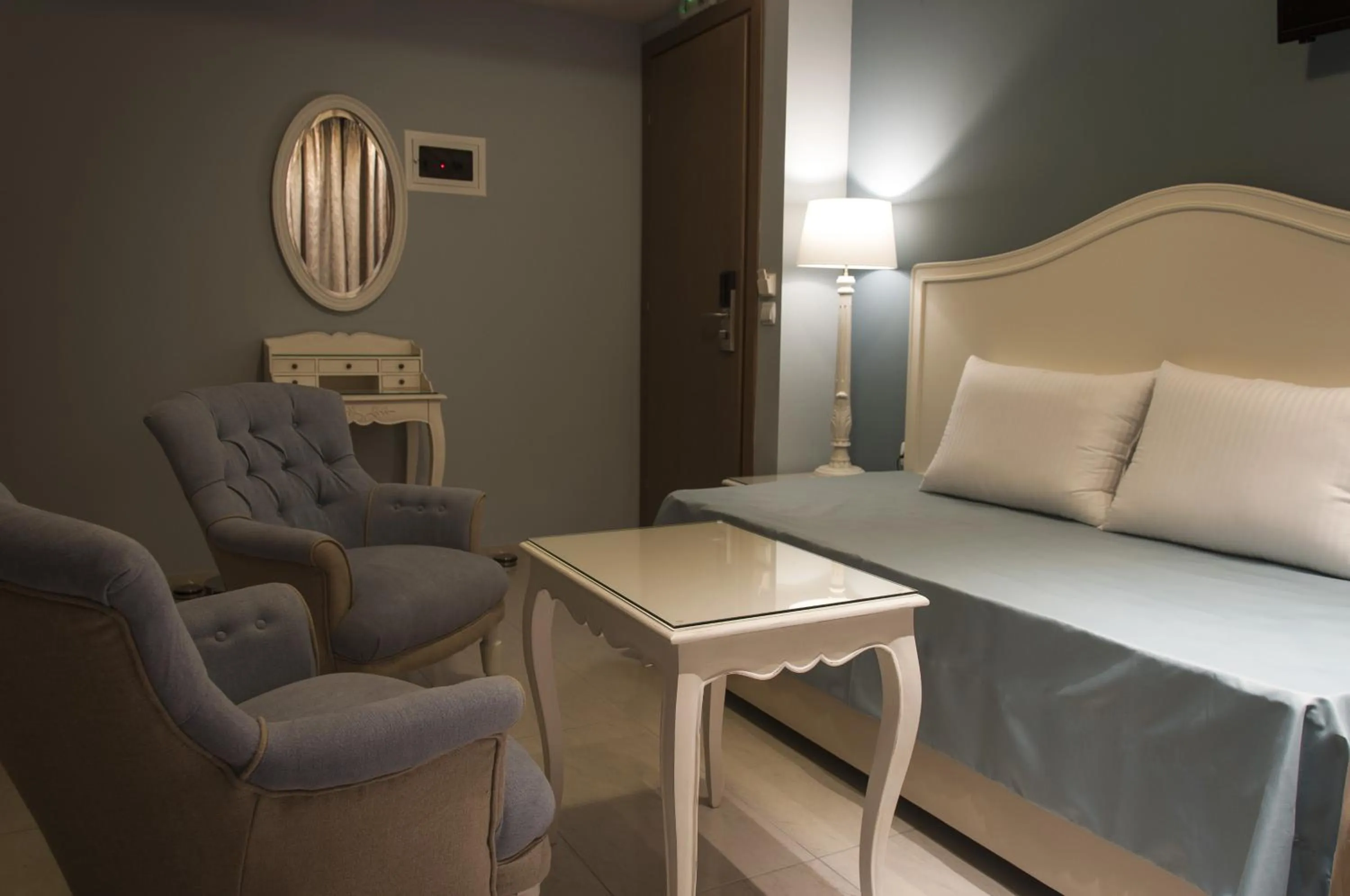 Seating area, Bed in Hotel Marianna