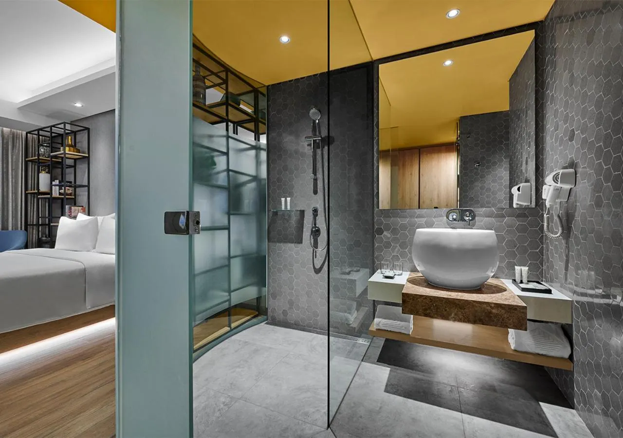 Bathroom, Bed in Nuanza Hotel & Convention Cikarang