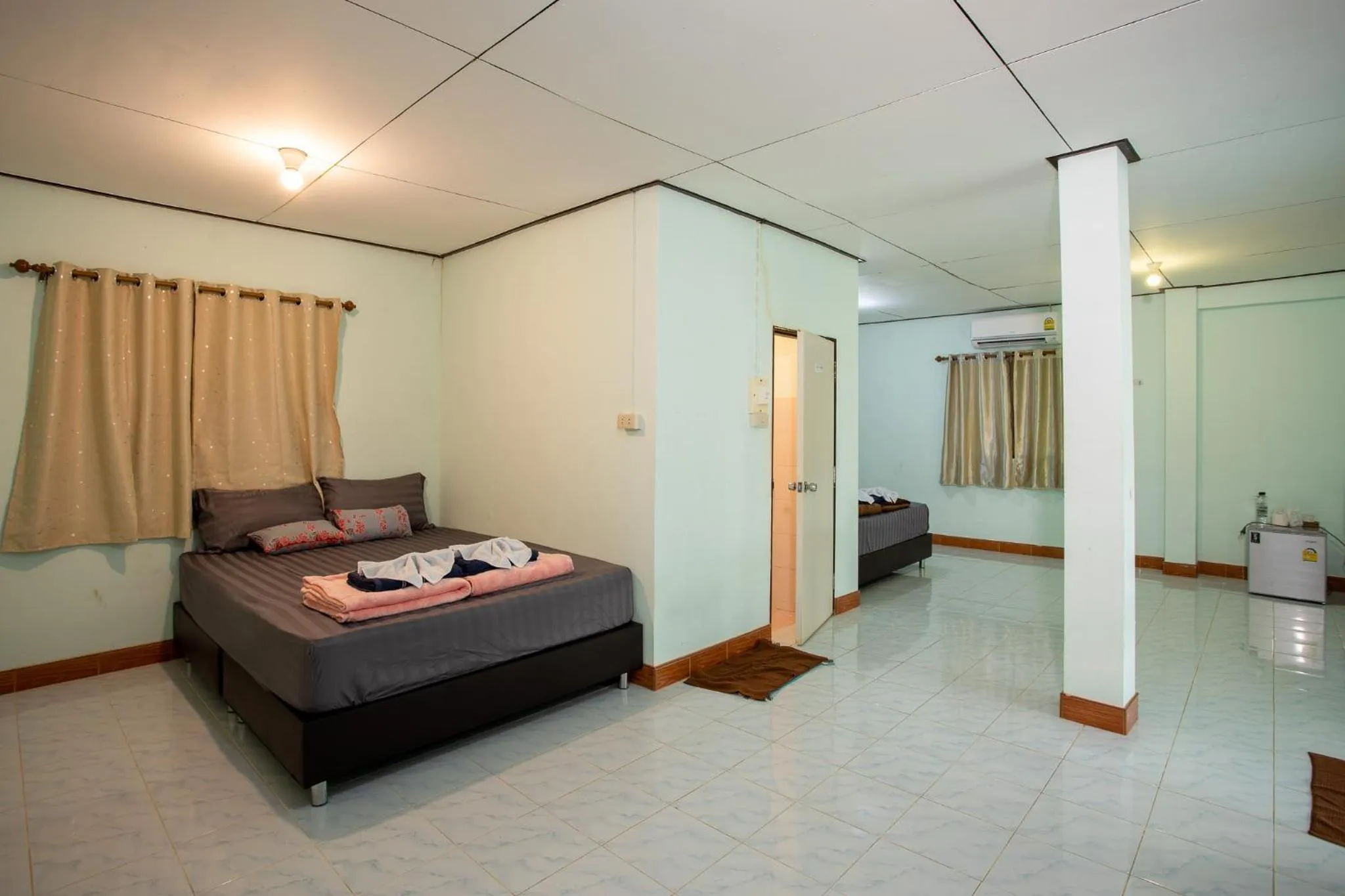 Bed in Andaman Peace Resort