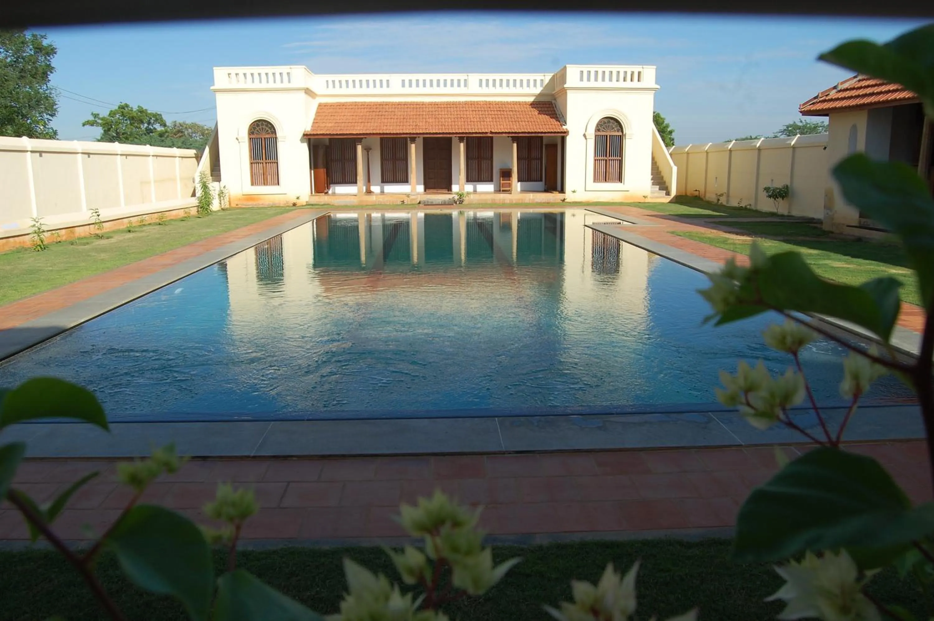 Swimming pool in Visalam Chettinad Palace - A CGH Earth Experience