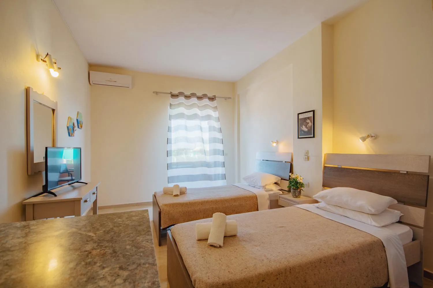 Bedroom in Villa Rosa Apartments