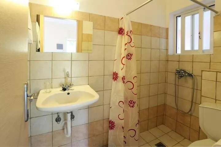 Shower in Villa Rosa Apartments