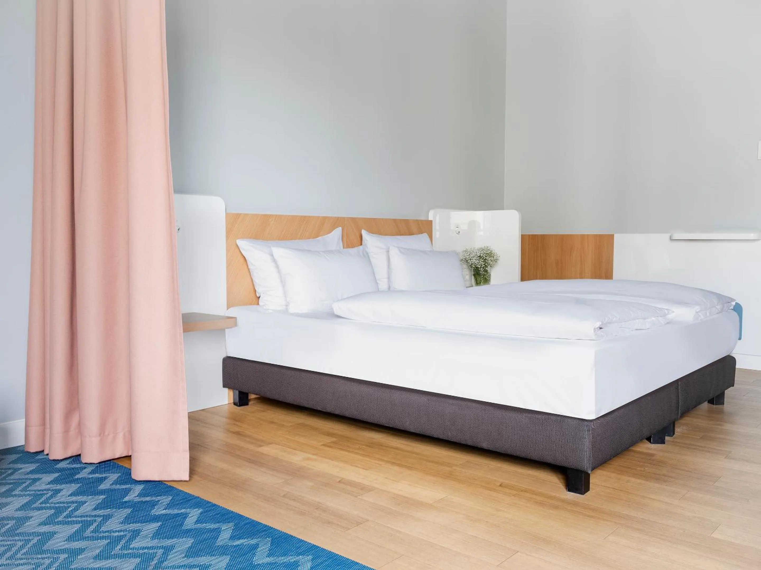 Bed in about:berlin Hotel