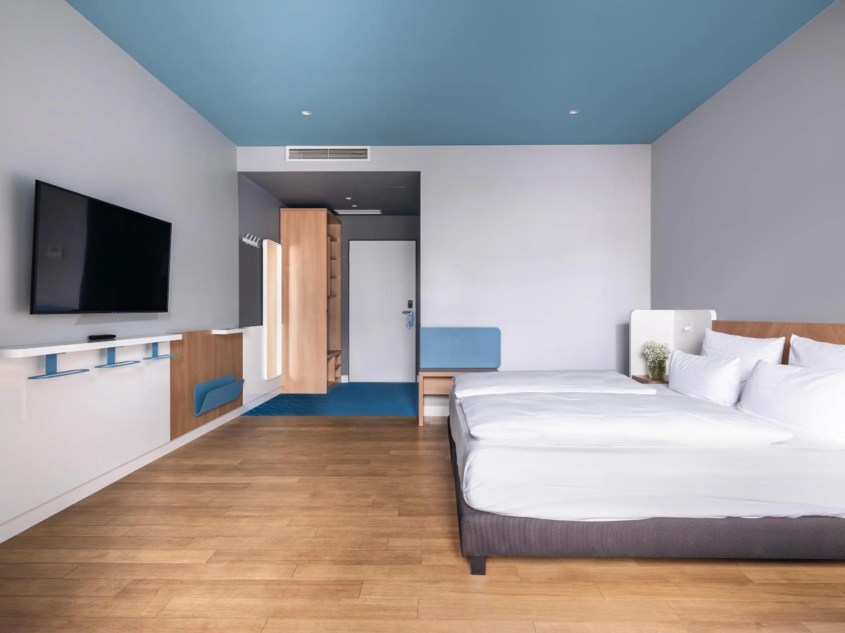 Bed in about:berlin Hotel