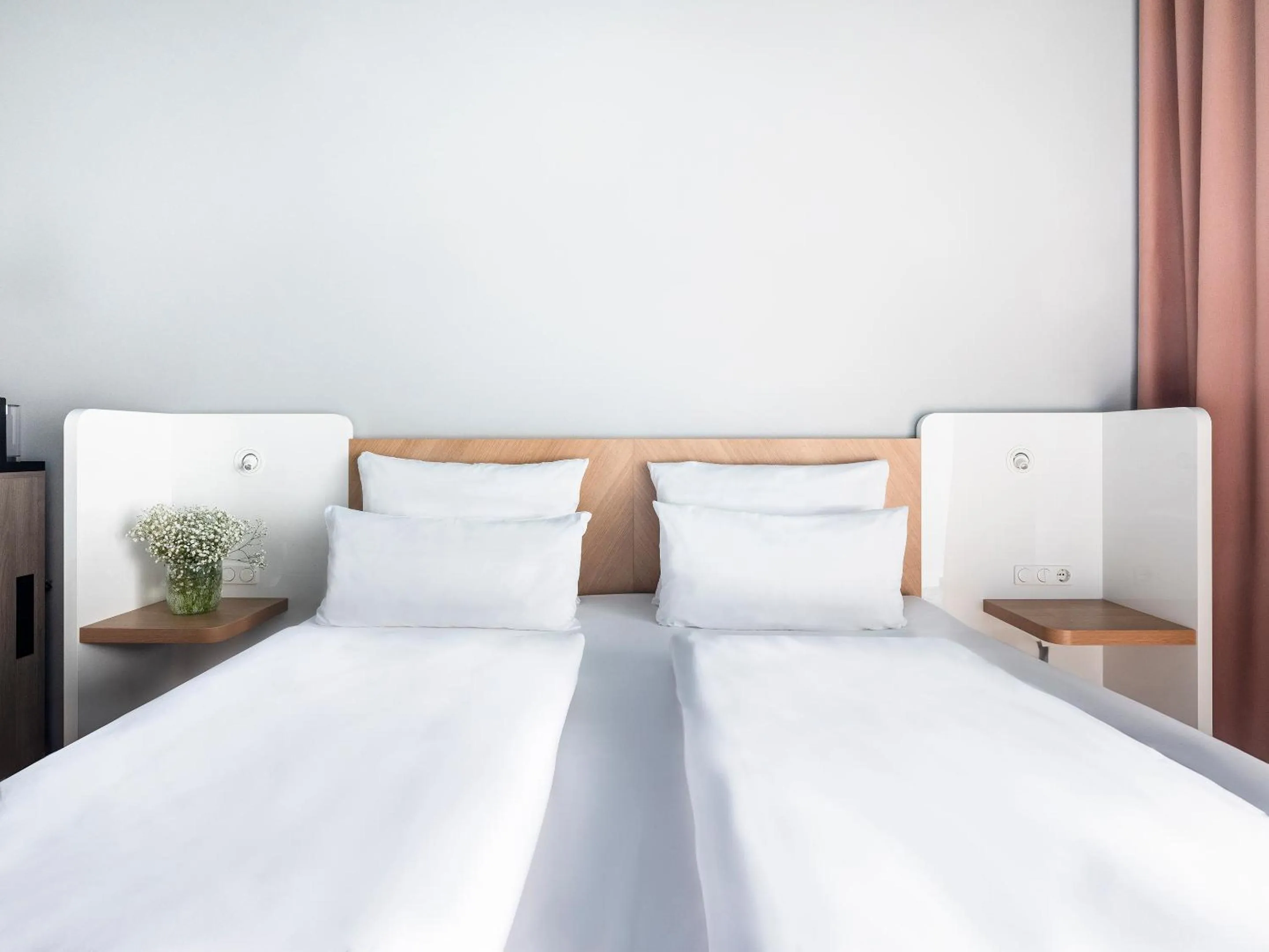 Bed in about:berlin Hotel