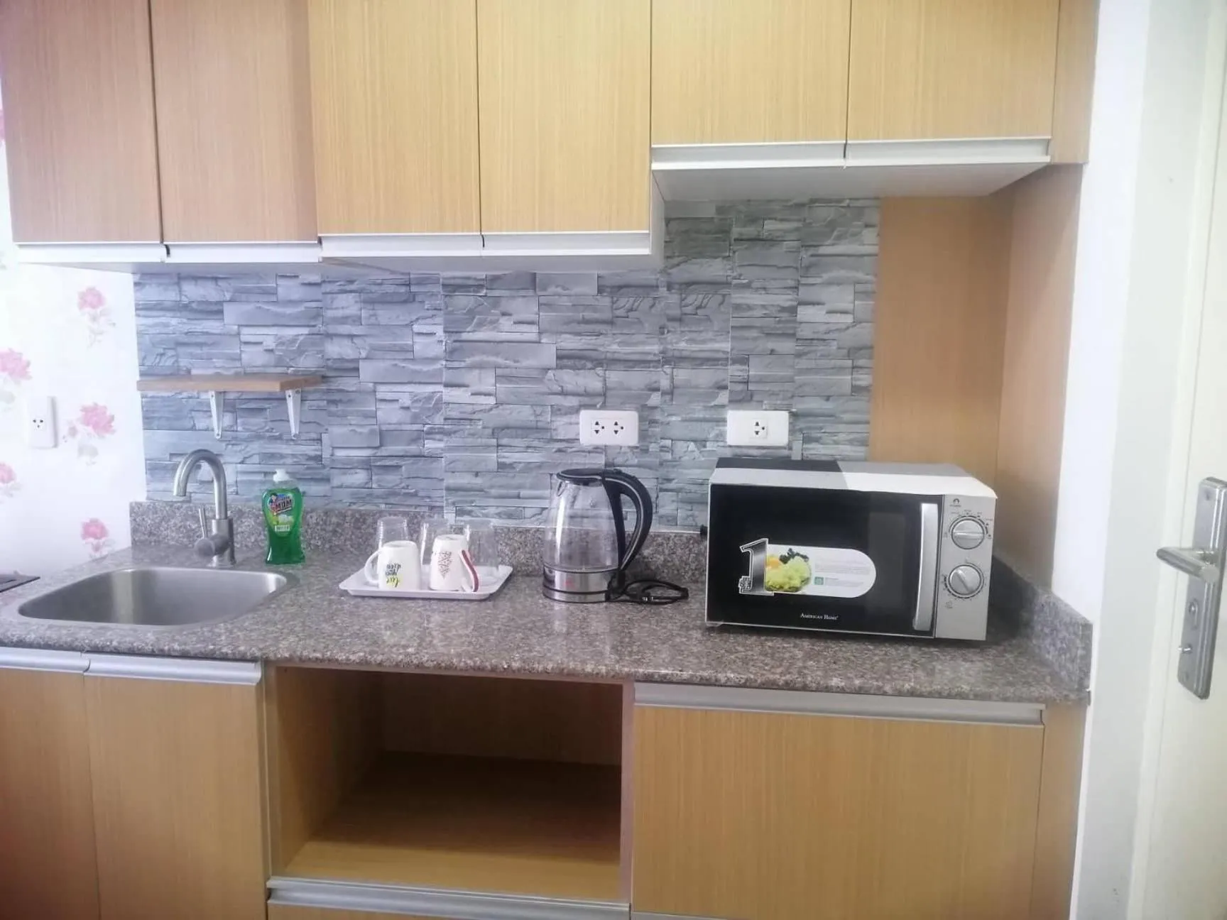 kitchen in ANIA CONDO STAY