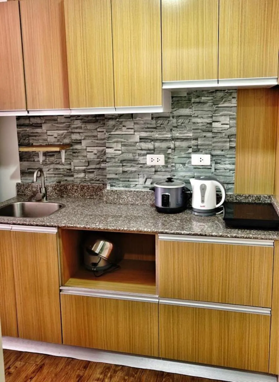 Kitchen or kitchenette in ANIA CONDO STAY
