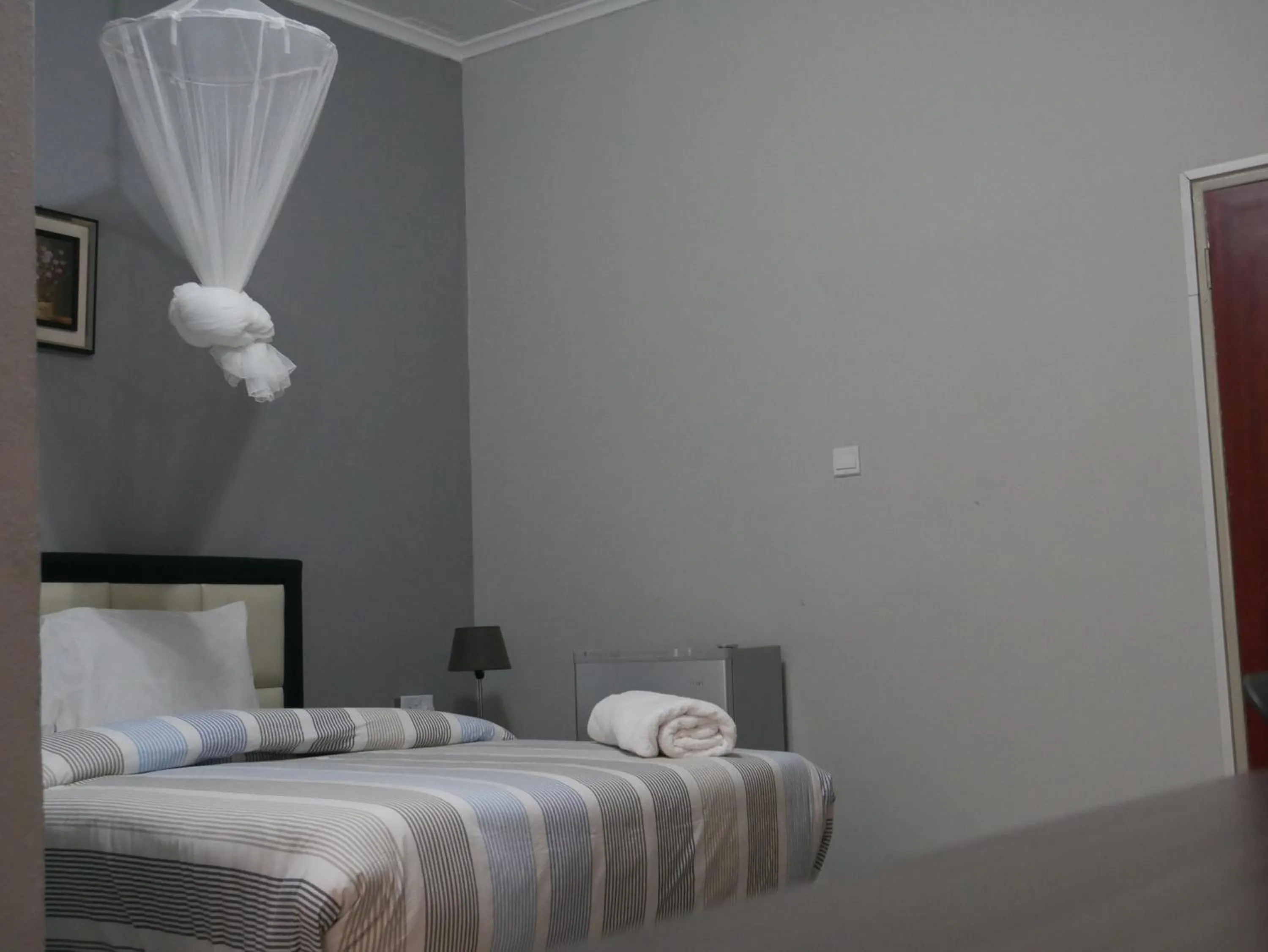 Bed in THE ESCAPE LODGE