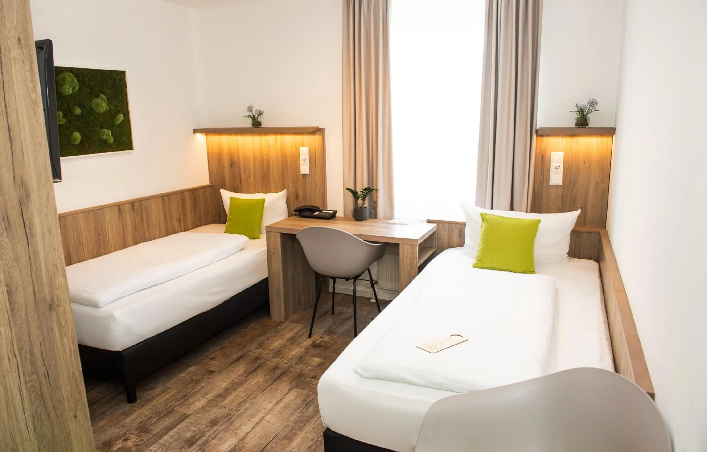 Photo of the whole room, Bed in Hotel Perlach Allee by Blattl