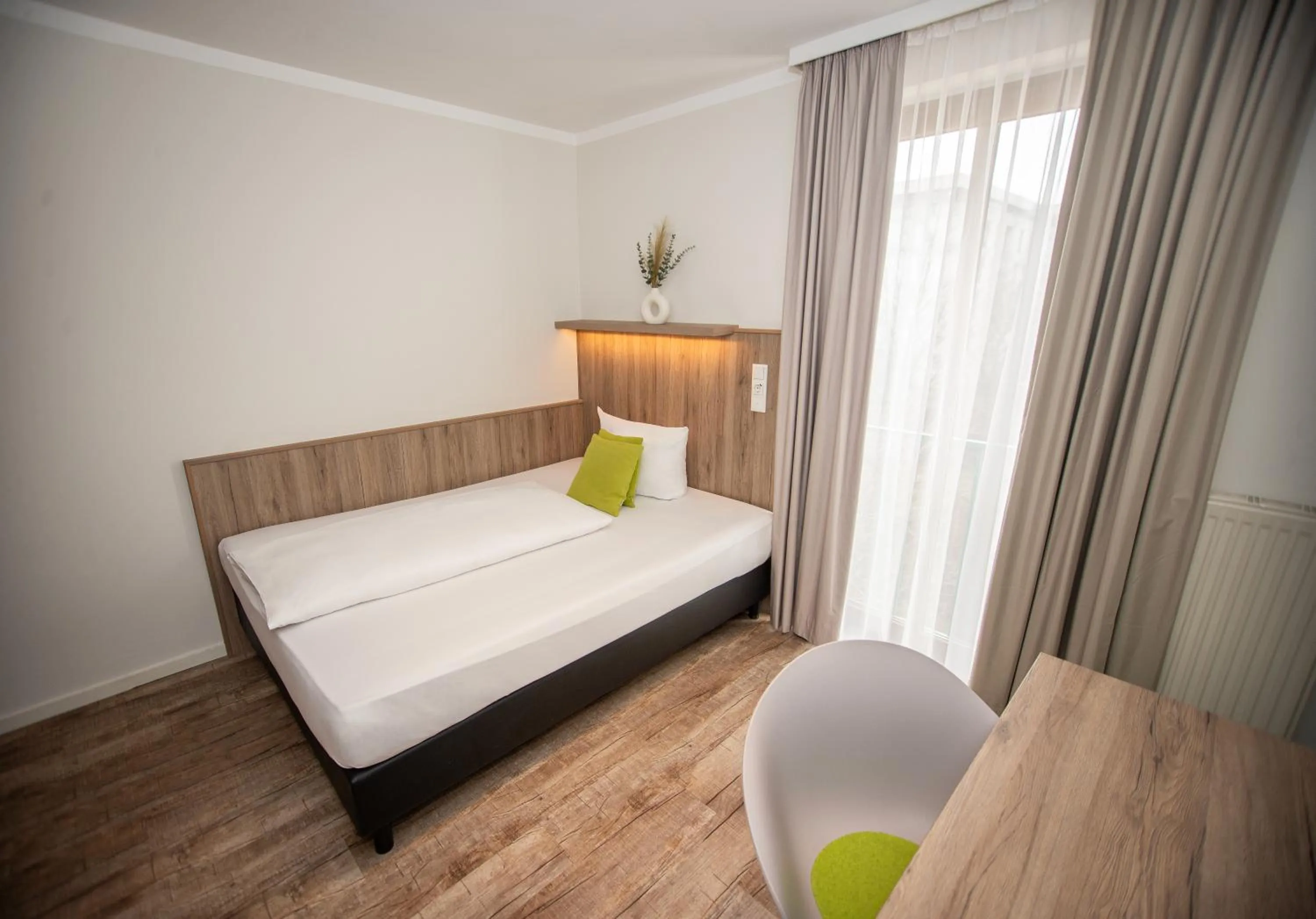 Photo of the whole room, Bed in Hotel Perlach Allee by Blattl