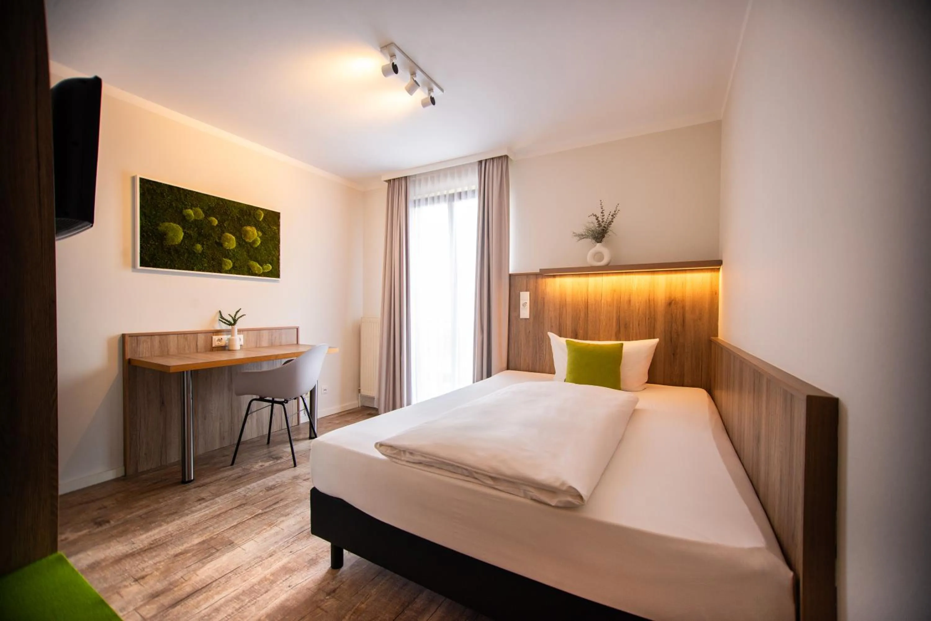 Photo of the whole room, Bed in Hotel Perlach Allee by Blattl