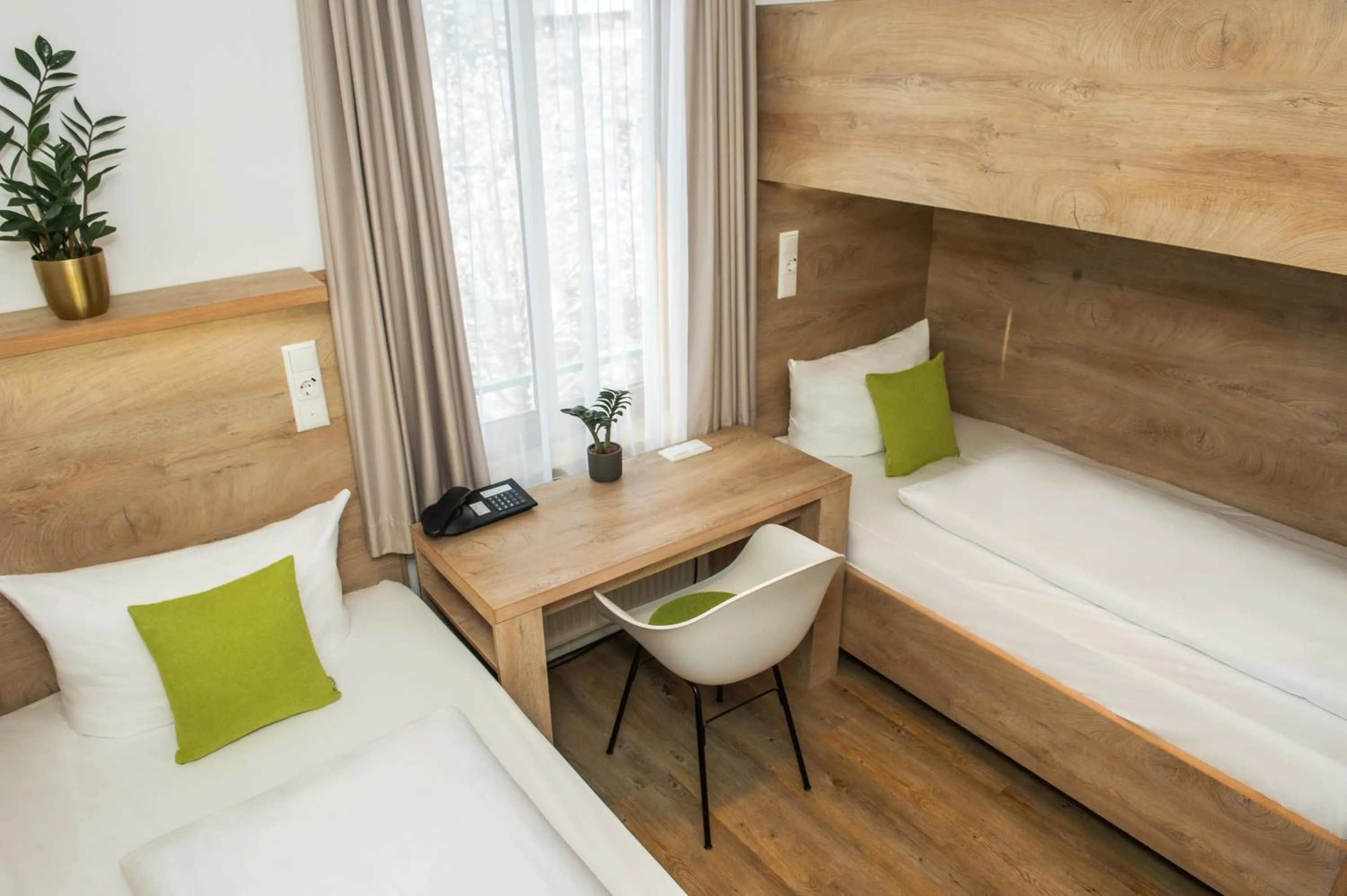 Photo of the whole room, Bed in Hotel Perlach Allee by Blattl