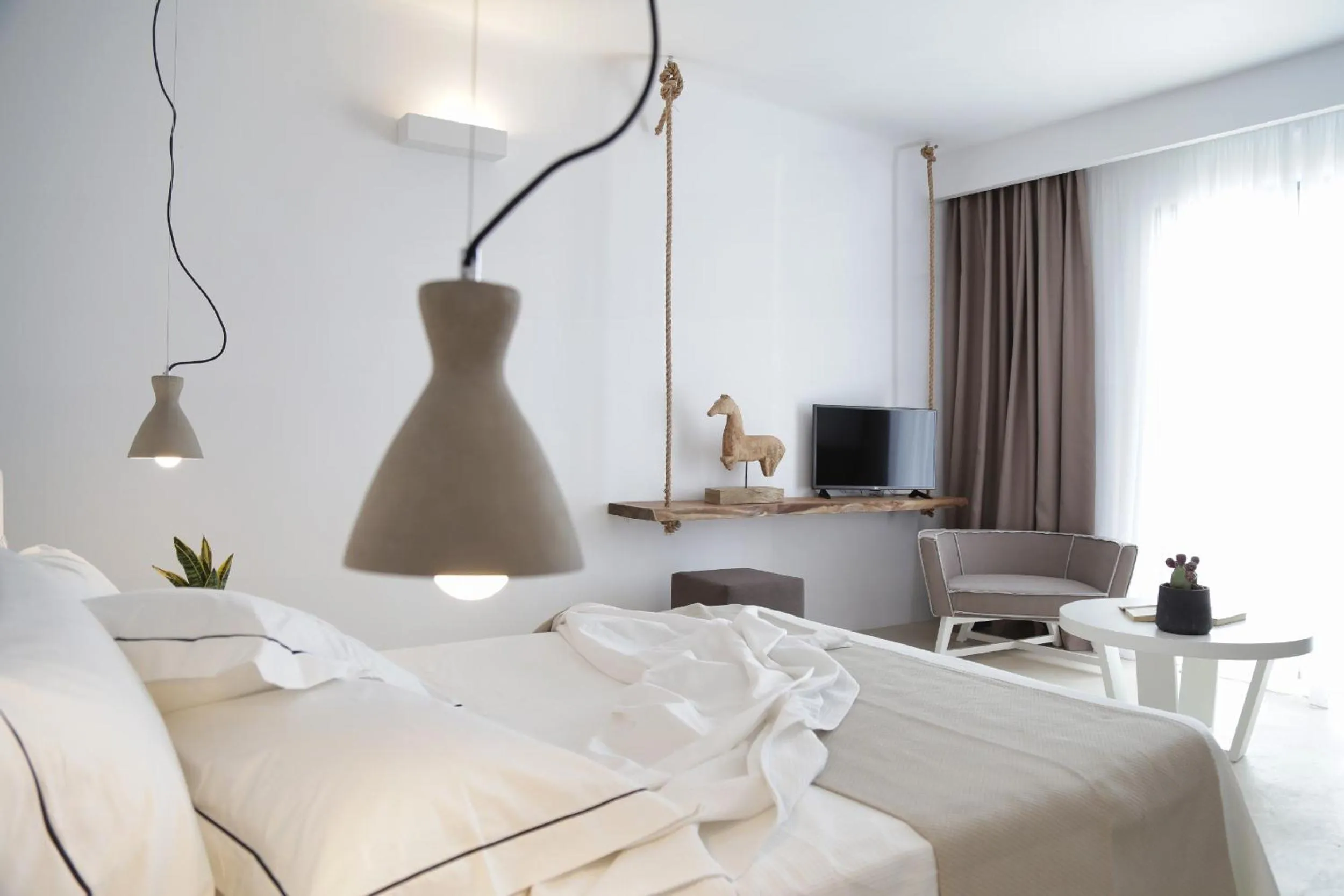 Photo of the whole room, Bed in Livin Mykonos Hotel - Adults Only