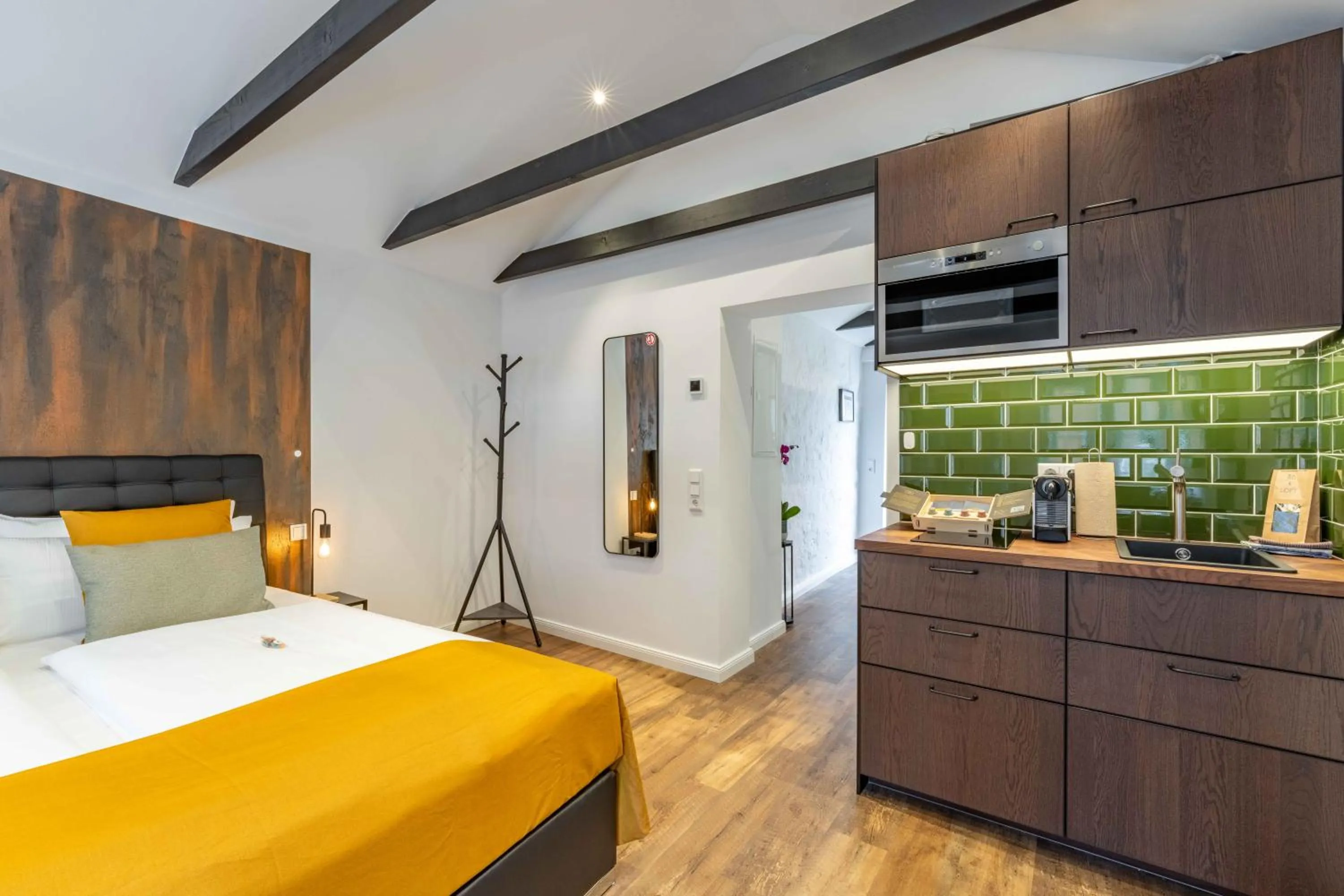 Bed in LÜTTES LOFT Boutique Hotel