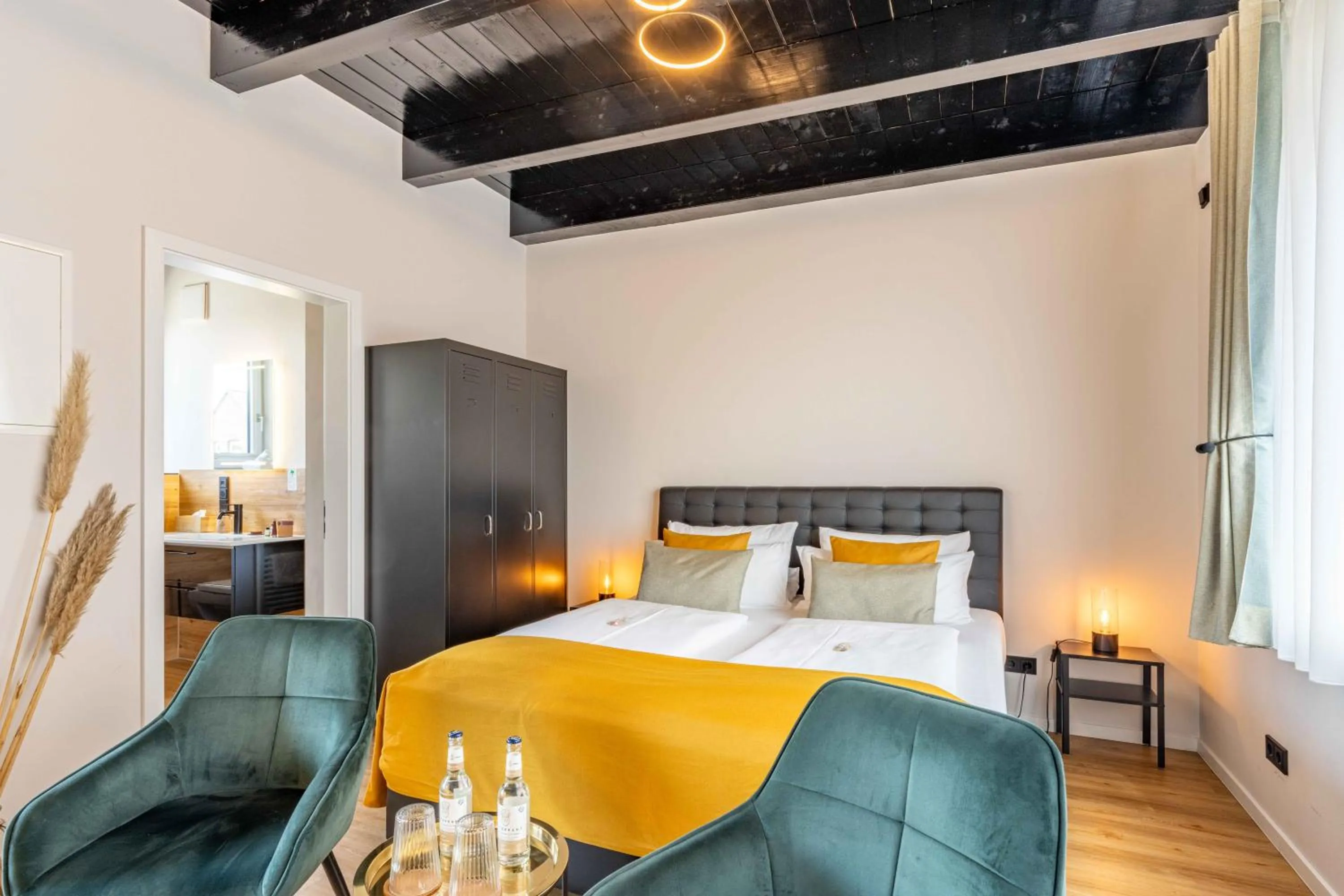 Bed in LÜTTES LOFT Boutique Hotel