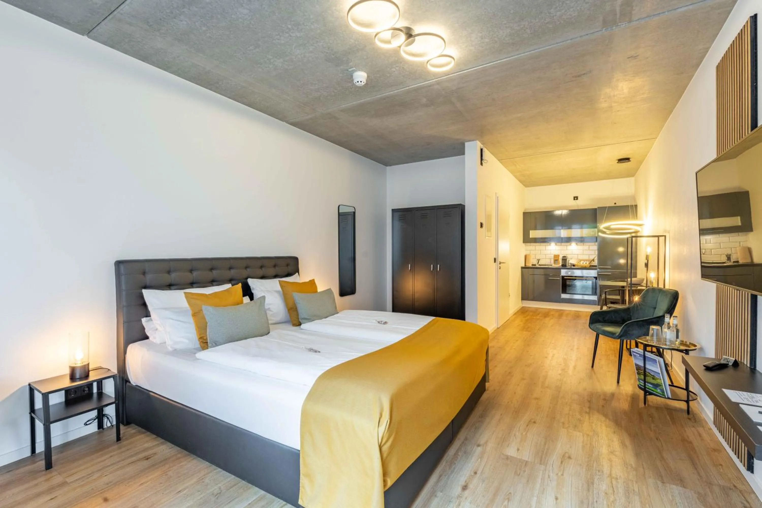 Bed in LÜTTES LOFT Boutique Hotel